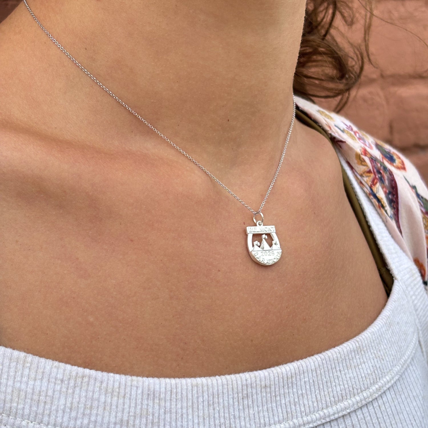 14k yellow gold limited edition 2026 Belmont at Saratoga horse racing charm featuring the Saratoga Race Course entrance steeples, by deJonghe Jewelry