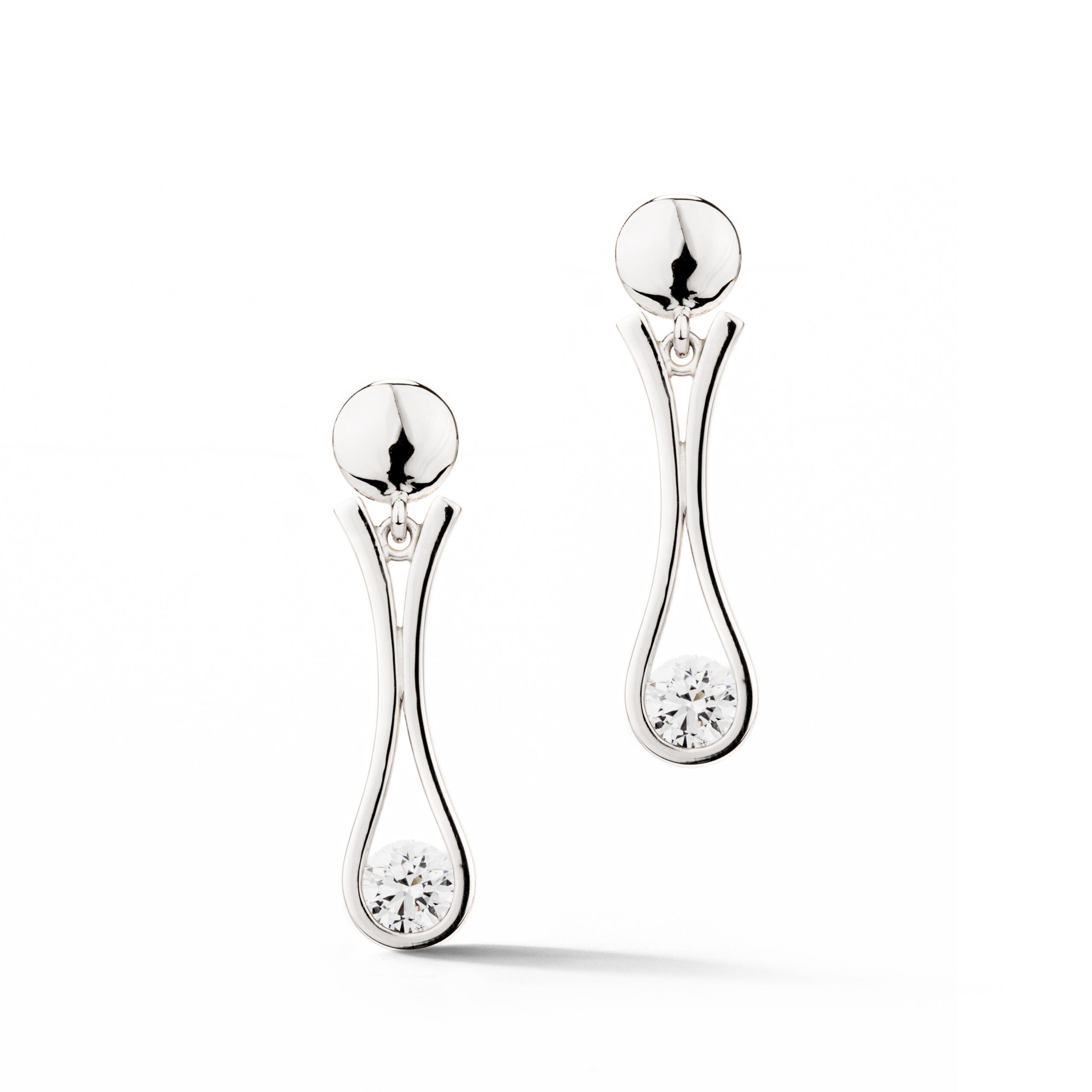 White gold teardrop earrings with bezel-set round diamonds