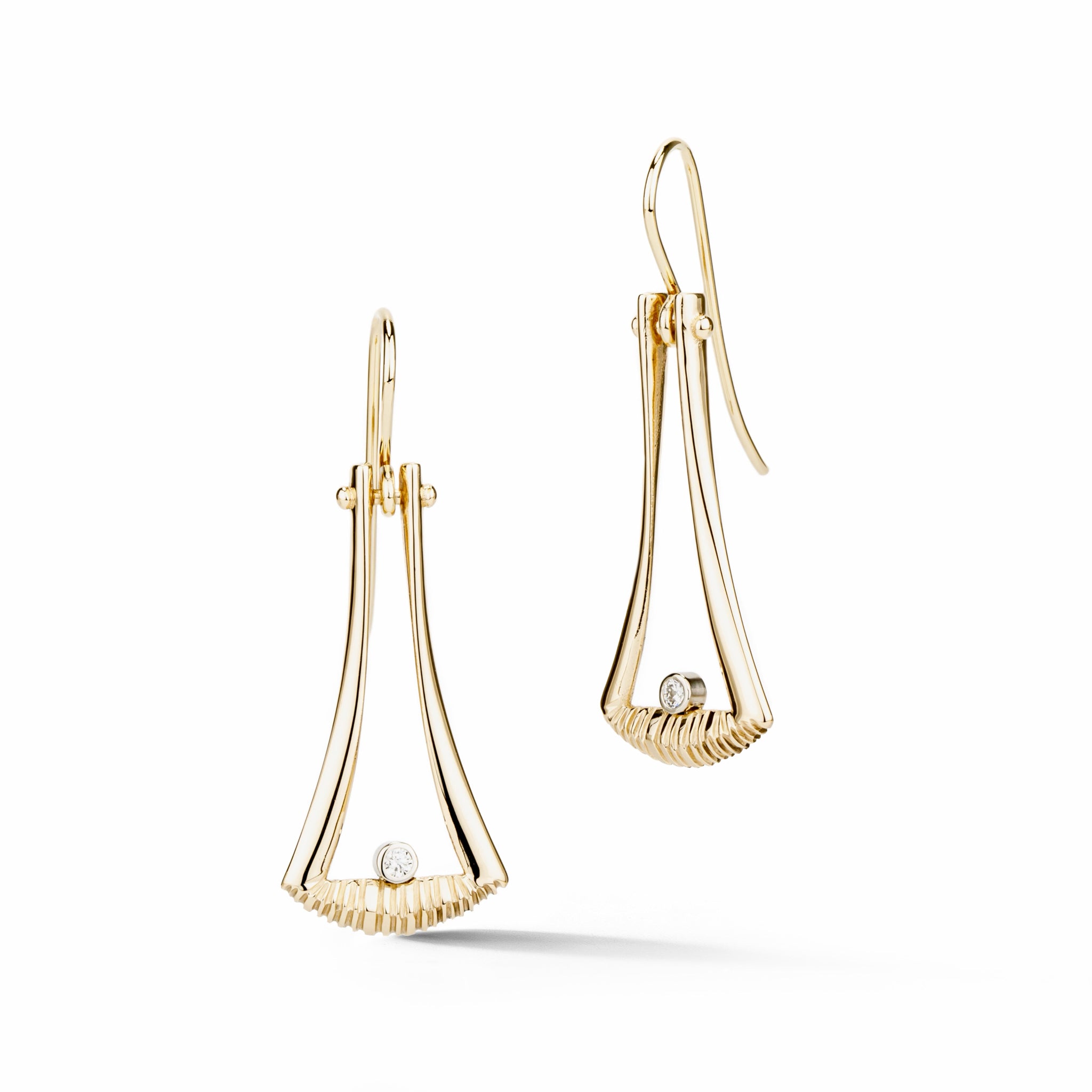 14k white gold flared dangle earrings with textured detail and diamond accents