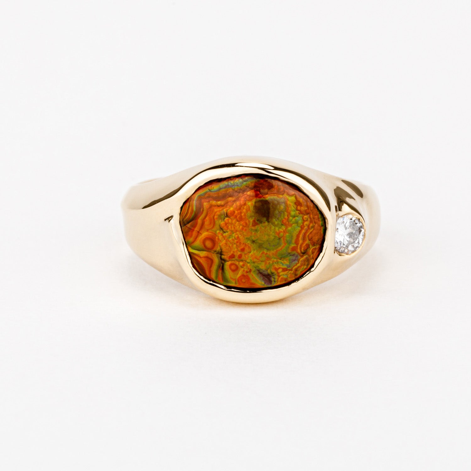 Fire agate signet ring in 14k yellow gold with diamond accent