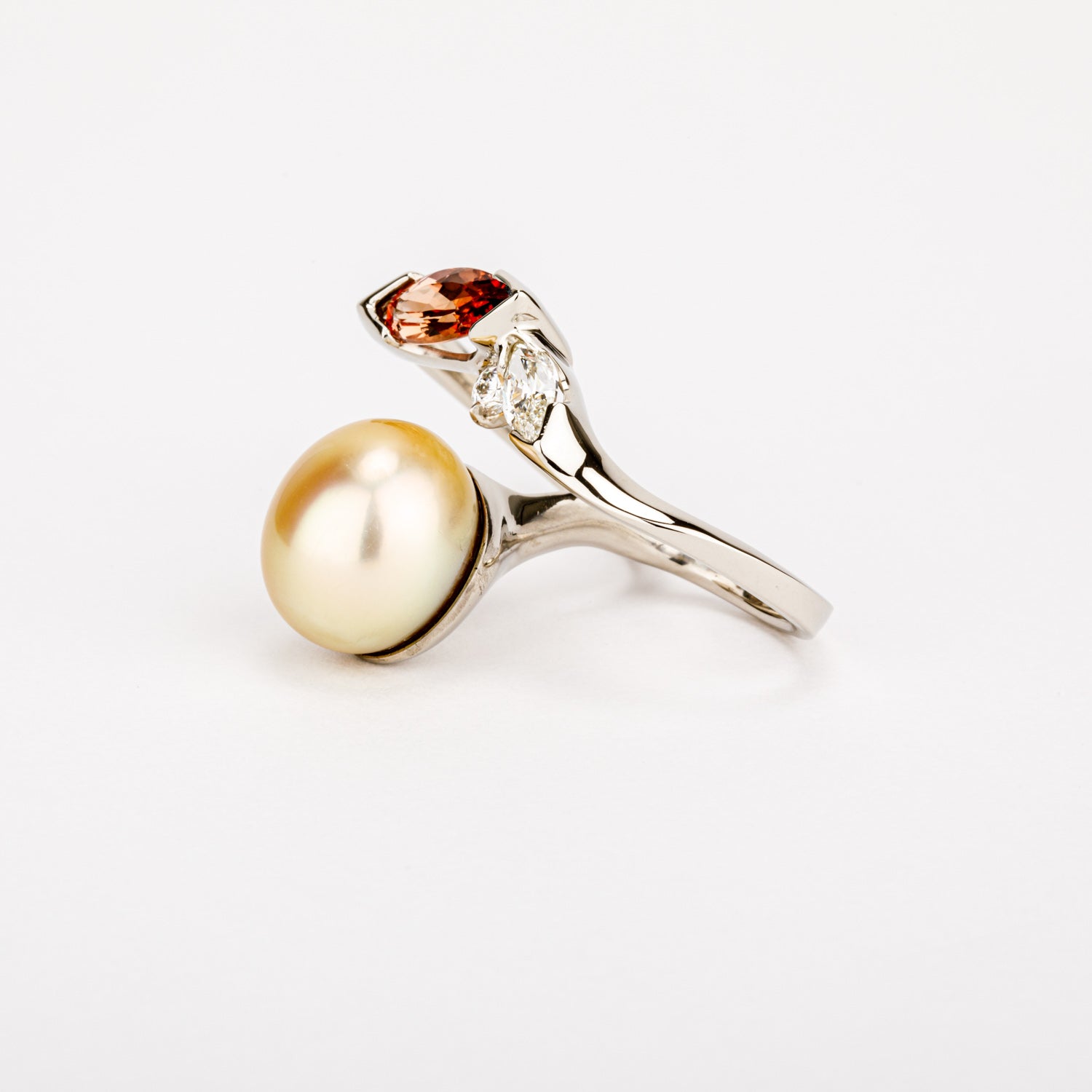 One of a kind golden Tahitian pearl double finger ring with imperial topaz and diamond in 14k white gold