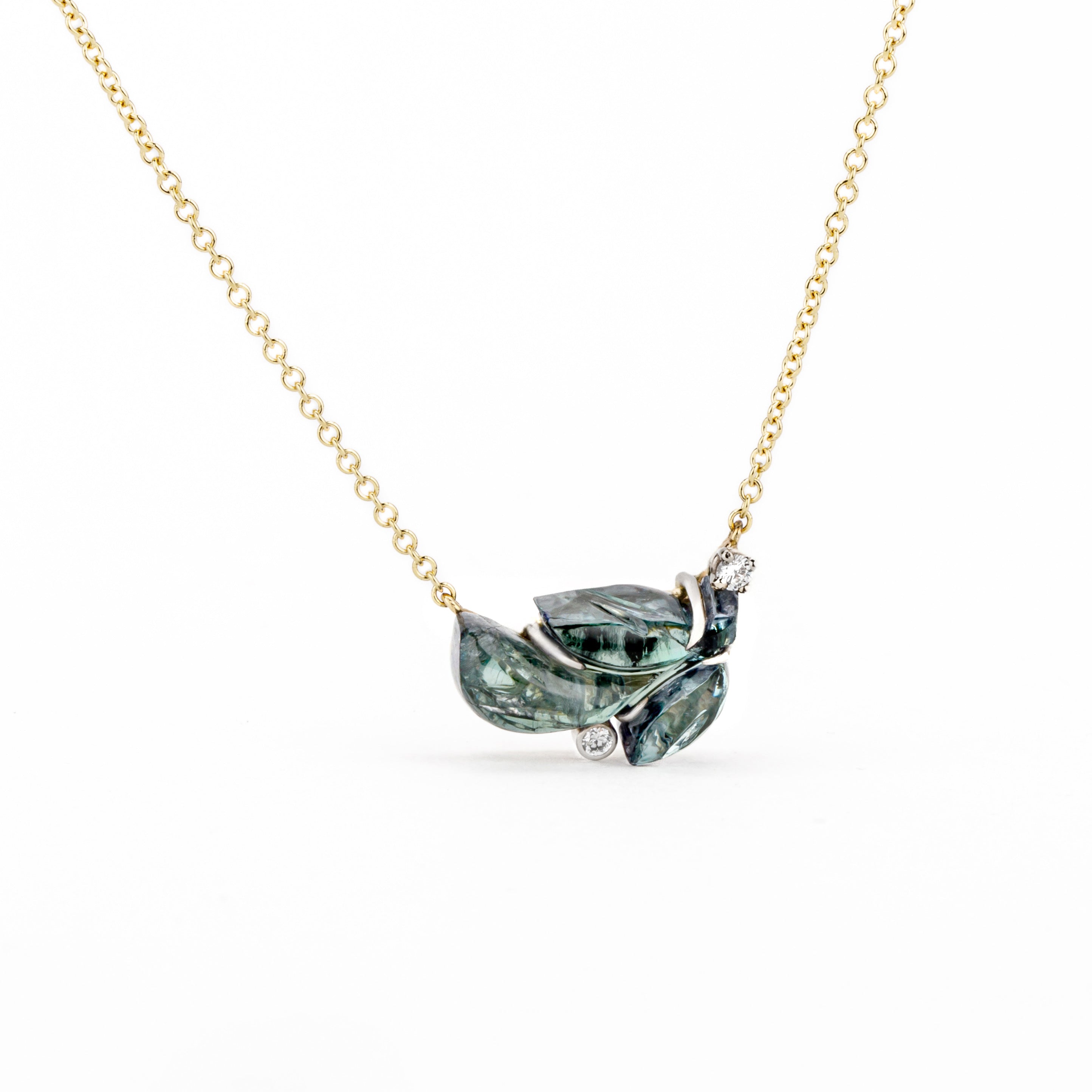 One of a Kind carved tanzanite leaf pendant necklace with diamonds on 14k yellow gold chain