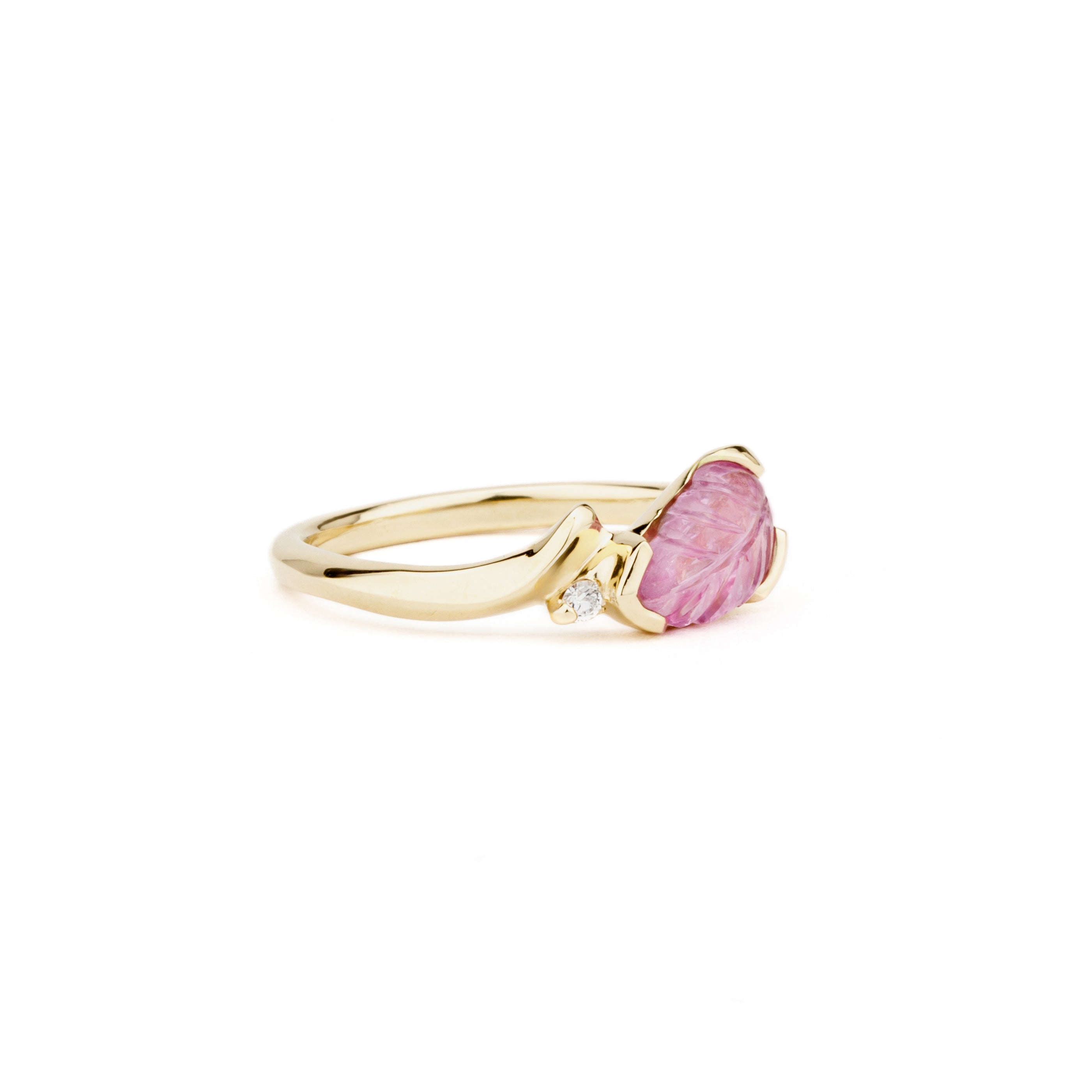 One of a kind carved pink sapphire leaf ring in 14K yellow gold with diamond accent
