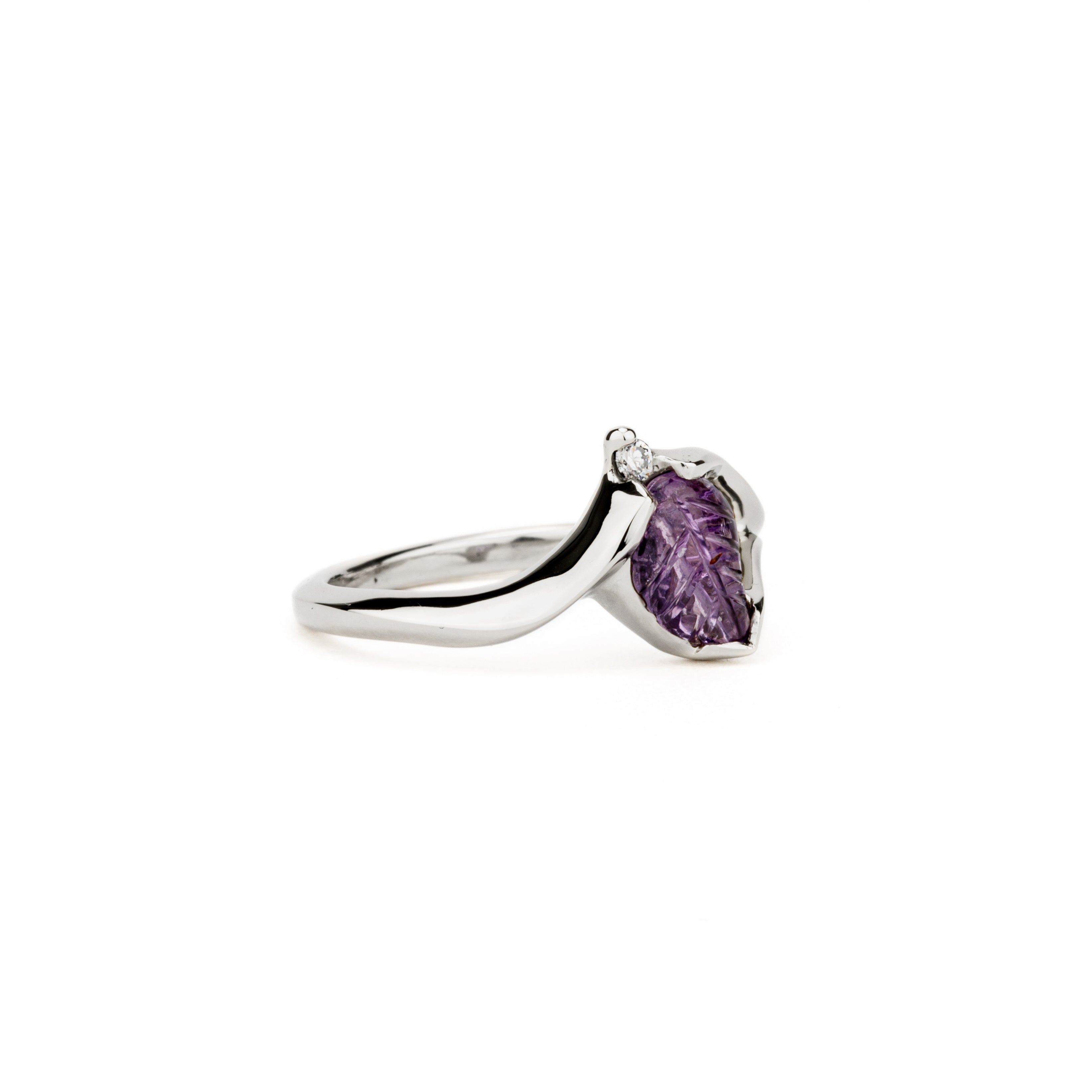 Purple sapphire leaf ring with diamond accent in white gold