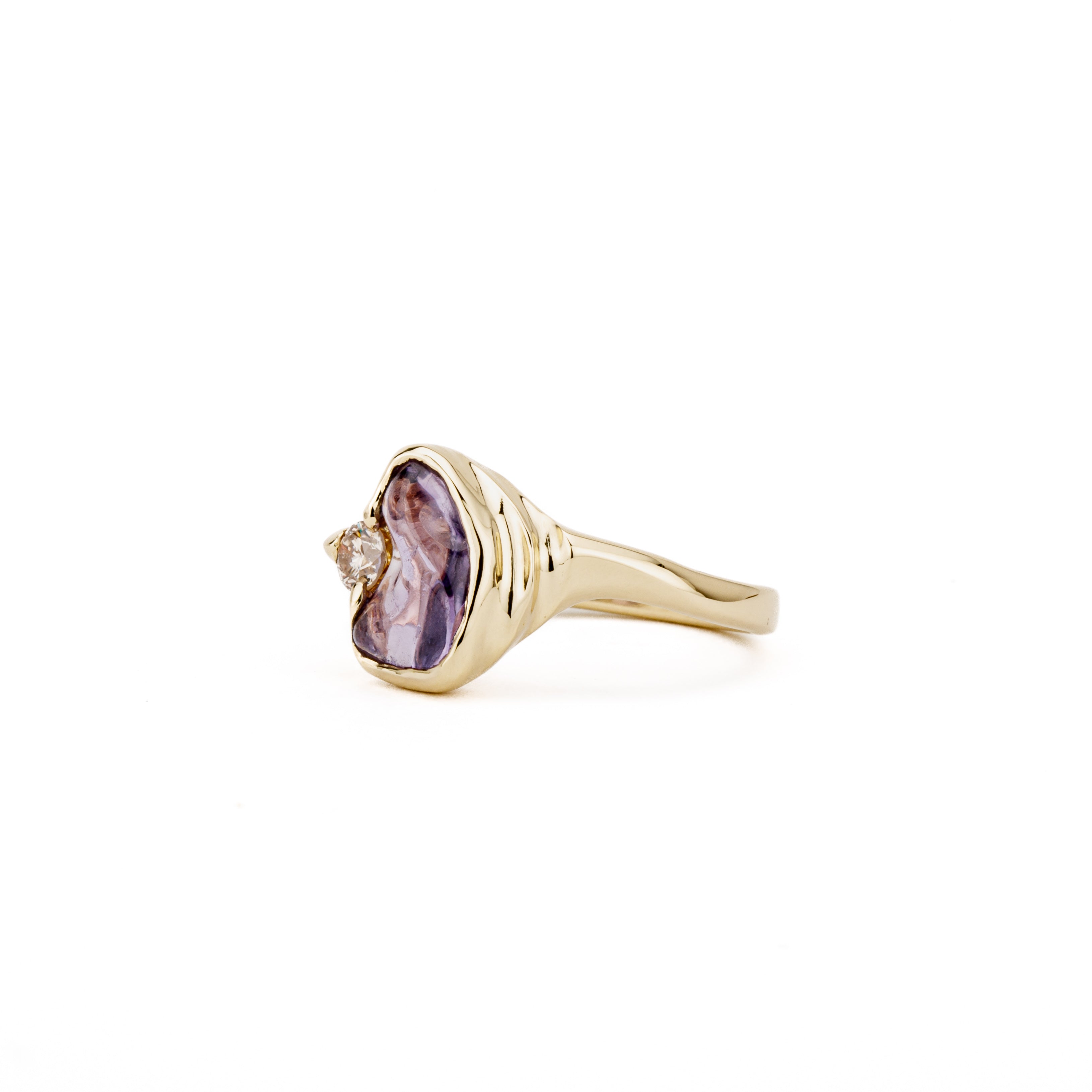 One of a kind purple sapphire cabochon ring with champagne diamond accent in 14K yellow gold