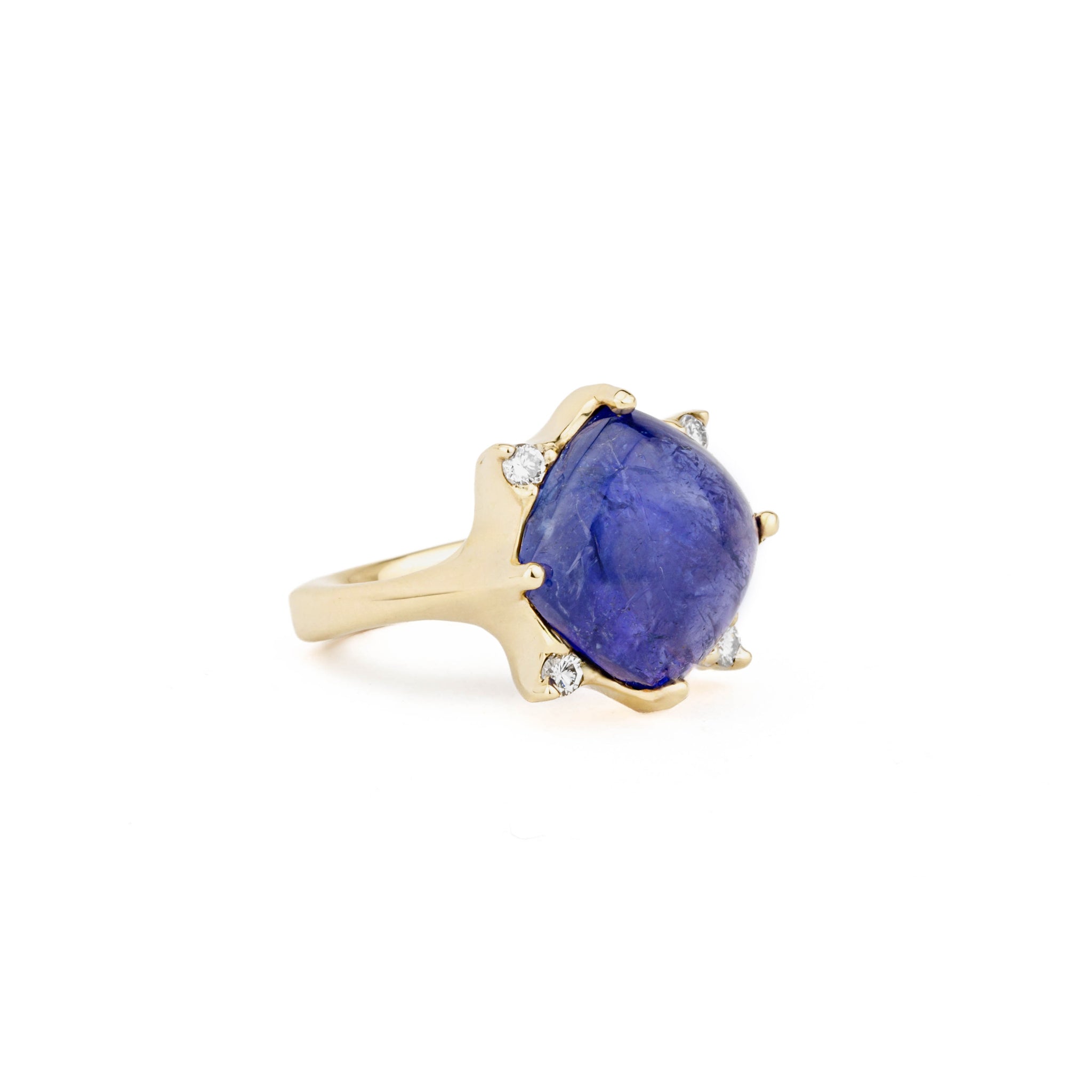 14k yellow gold ring with 11.79ct cabochon tanzanite center stone and four round diamond accents in a sunburst setting, size 7.25