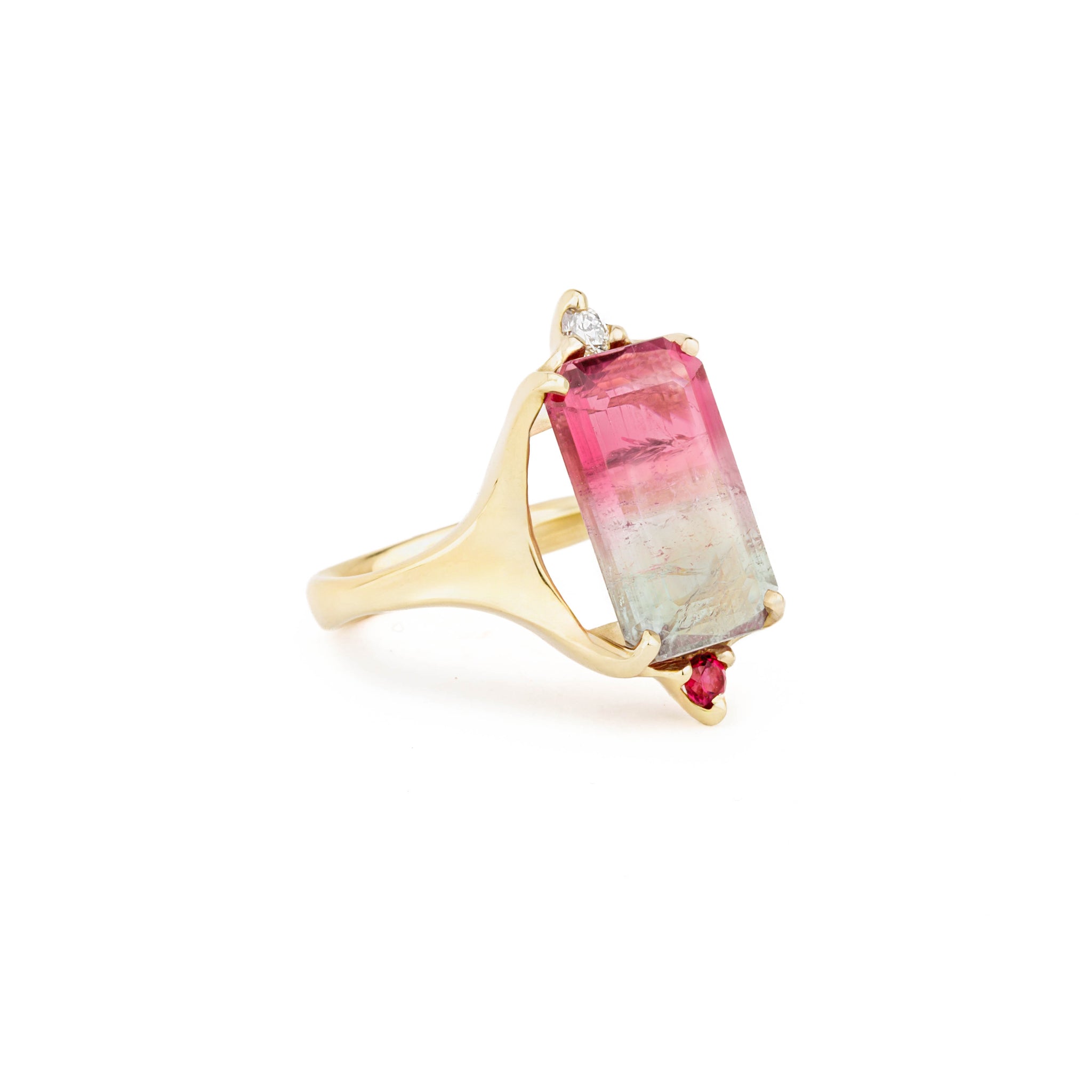 14k yellow gold ring with an emerald cut bi-color pink and green tourmaline, diamond accent, and reddish sapphire accent, size 7.75