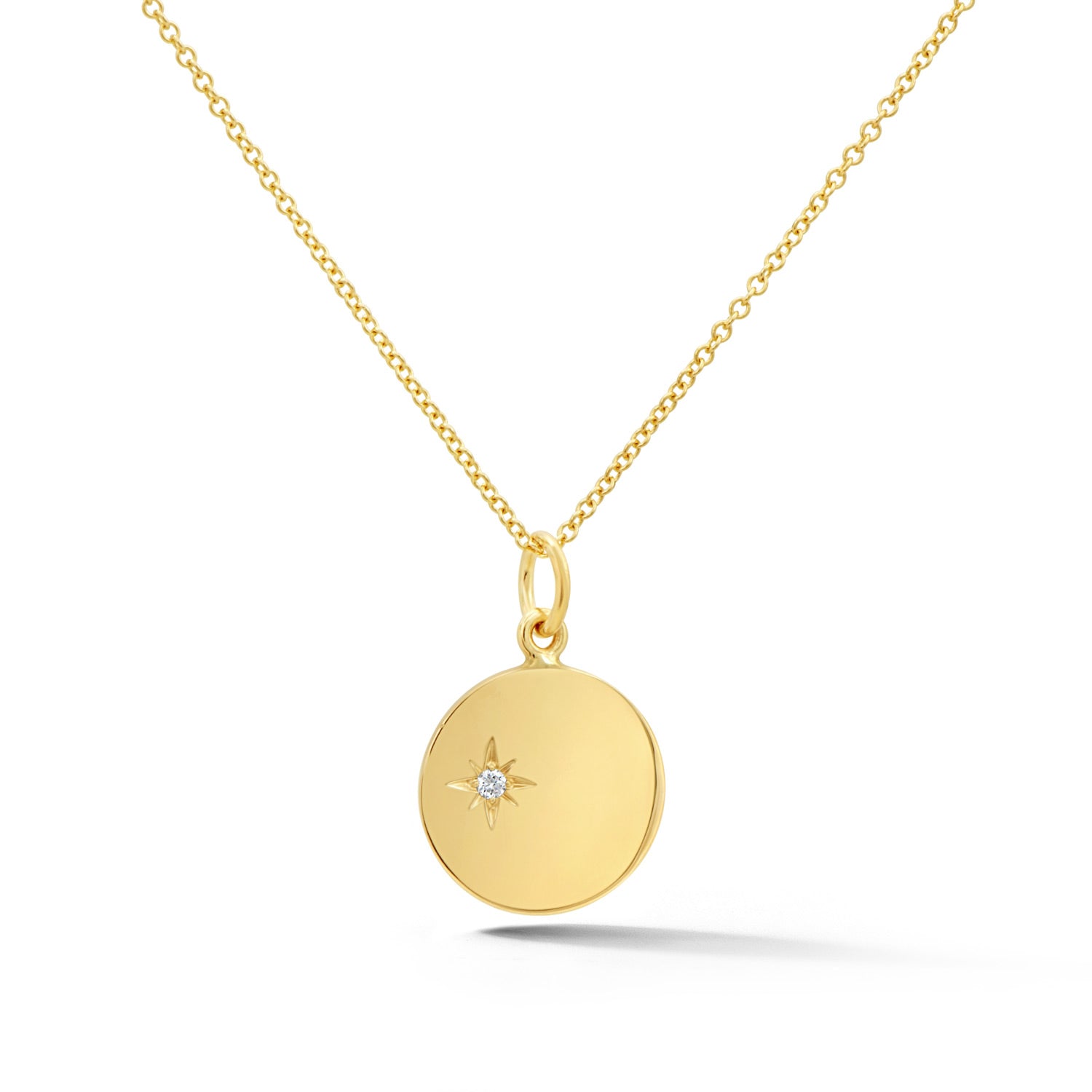 14k yellow gold circular disc pendant necklace with diamond starburst center