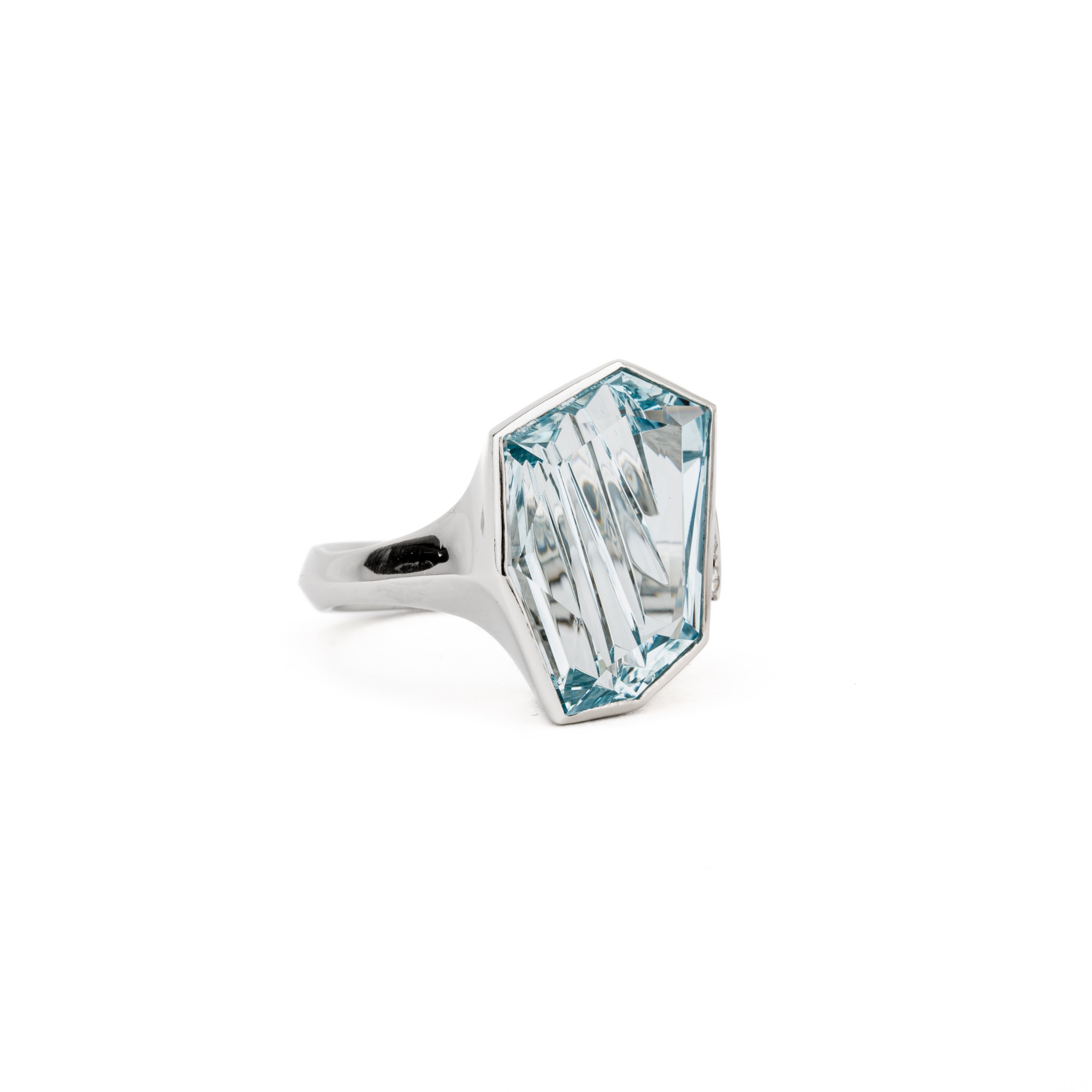 Platinum aquamarine ring with Kreis cut aquamarine gemstone and diamond accent