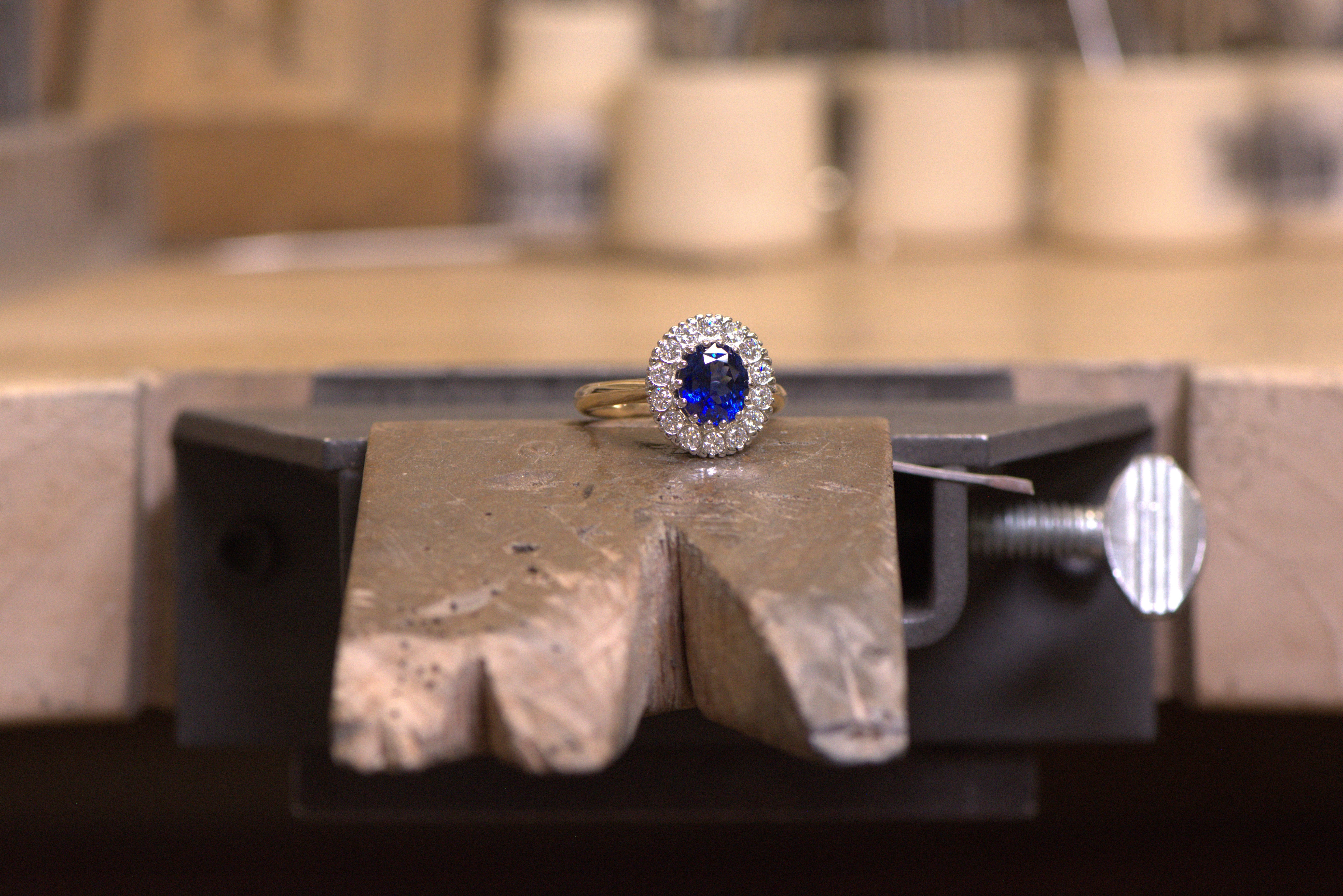 Blue sapphire ring with a diamond halo
