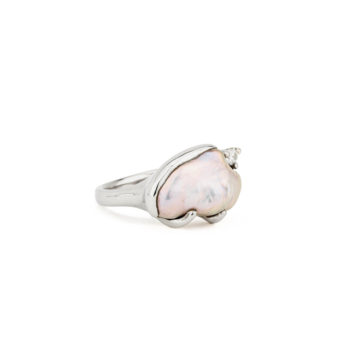 14k white gold ring with natural keshi freshwater pearl in freeform shape, accented by one round diamond, size 7.25