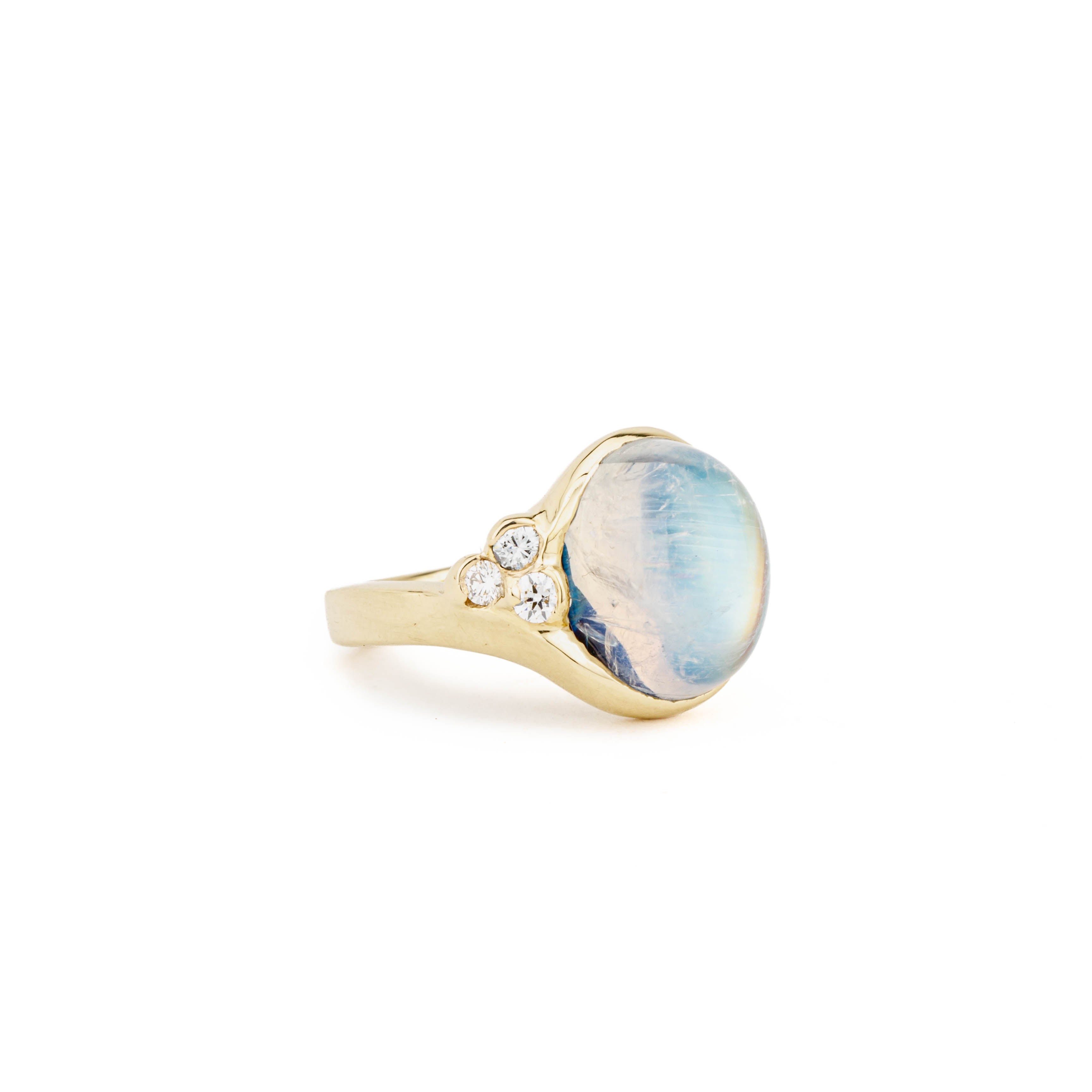 14k yellow gold ring with 7.22ct oval cabochon moonstone in bezel setting and cluster of three round diamonds, size 7
