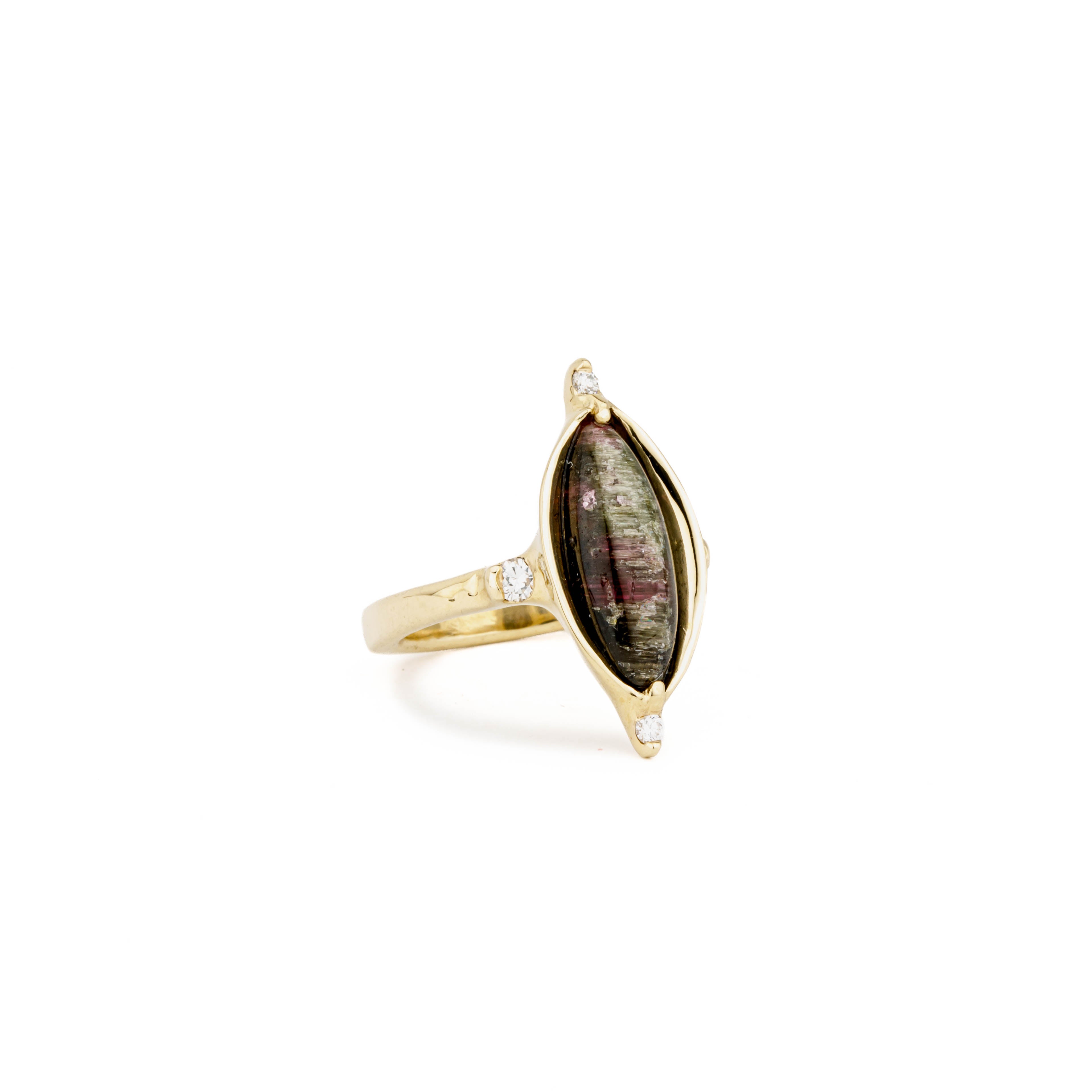 14k yellow gold ring with a marquise cat's eye tourmaline in an open two-prong bezel, accented by four round diamonds in a half-wrap setting.