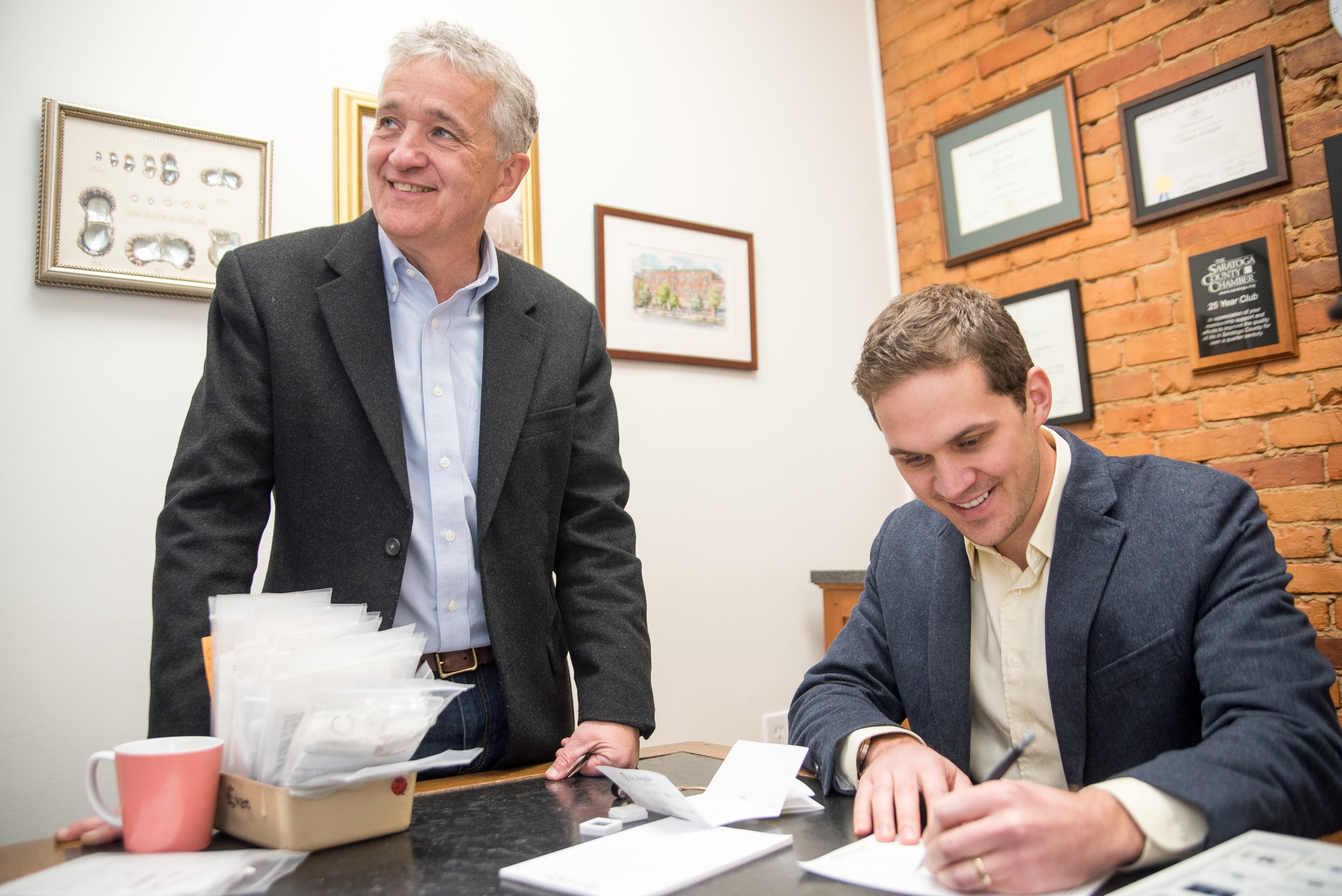 Evan and Dennis deJonghe designing jewelry at deJonghe Original Jewelry