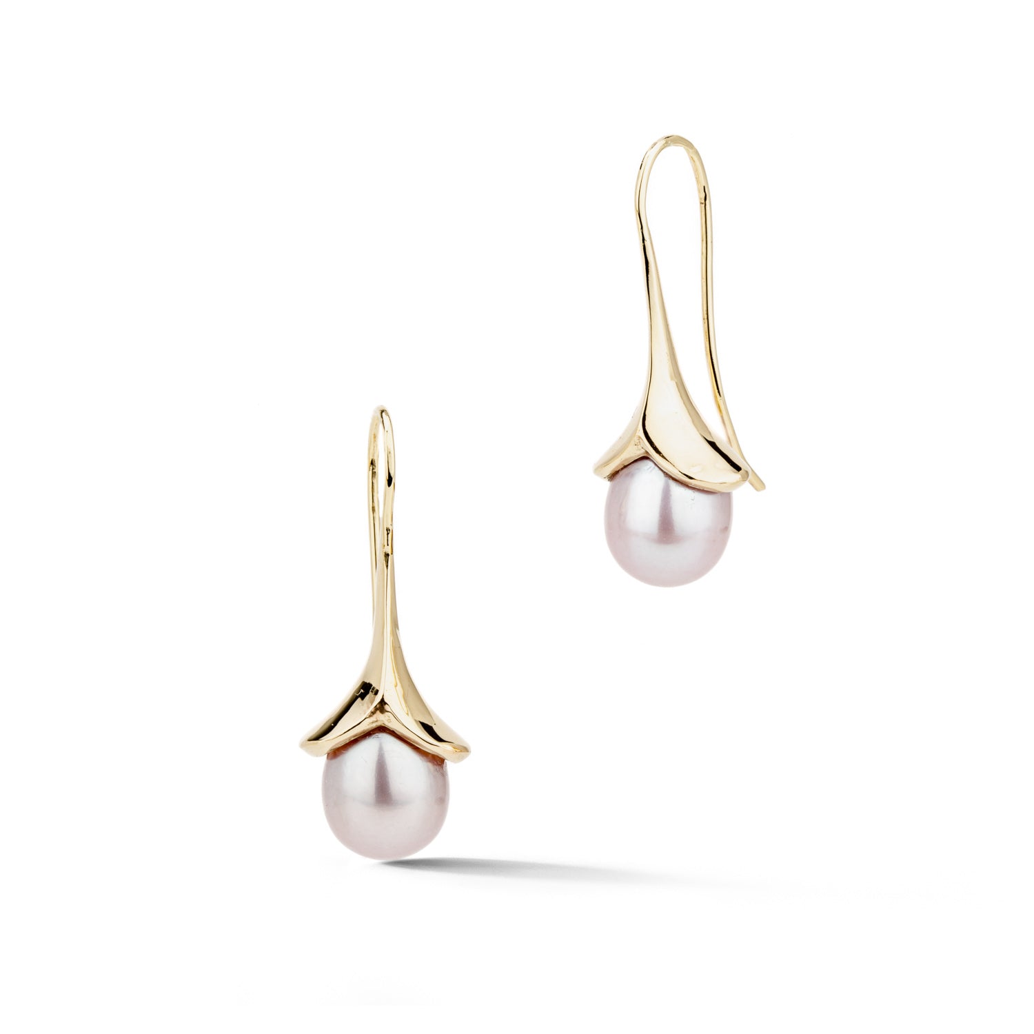 Peach freshwater pearl earrings with carved 14k yellow gold caps and French backs