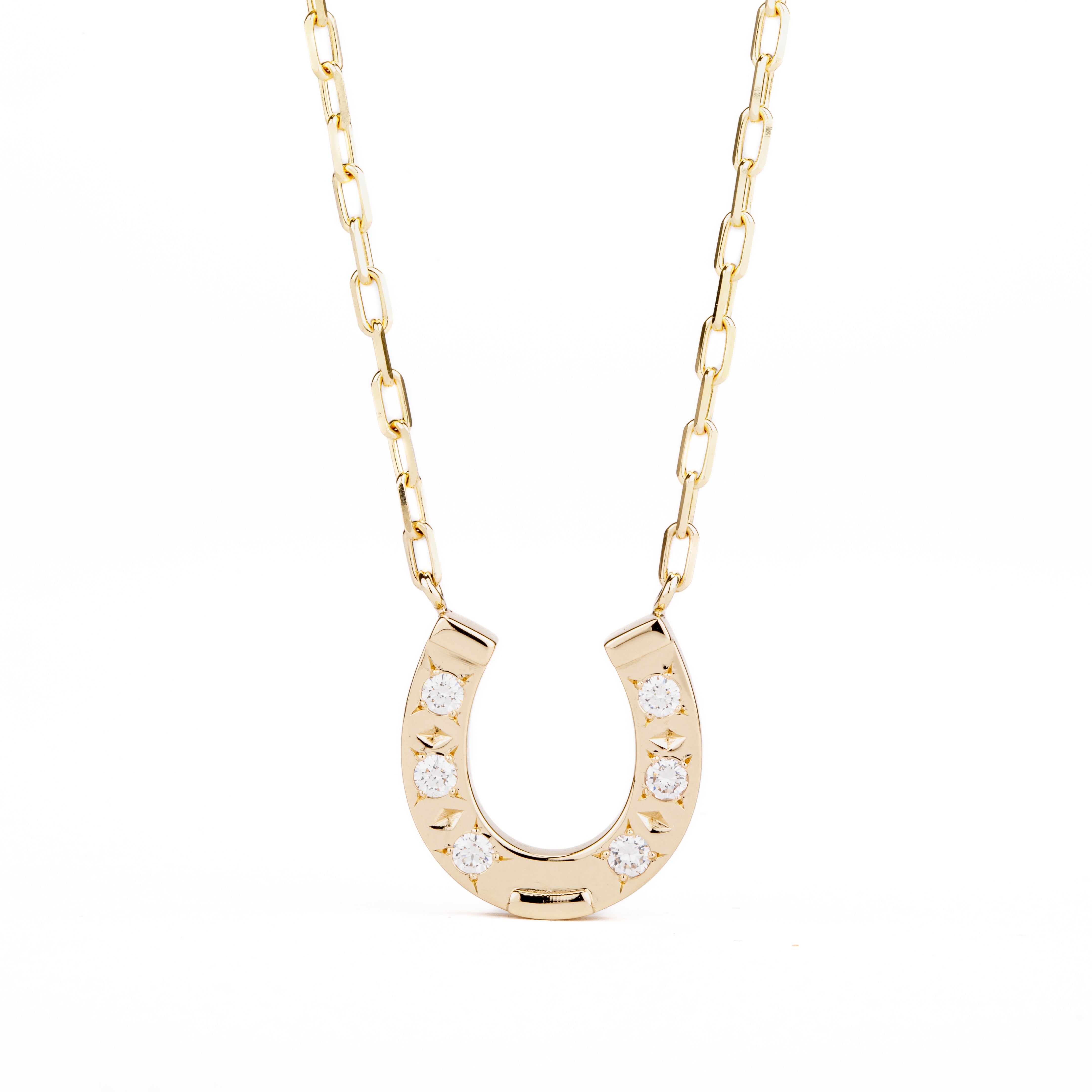 14k yellow gold horseshoe pendant necklace with six flush-set round diamonds on a paperclip-link chain