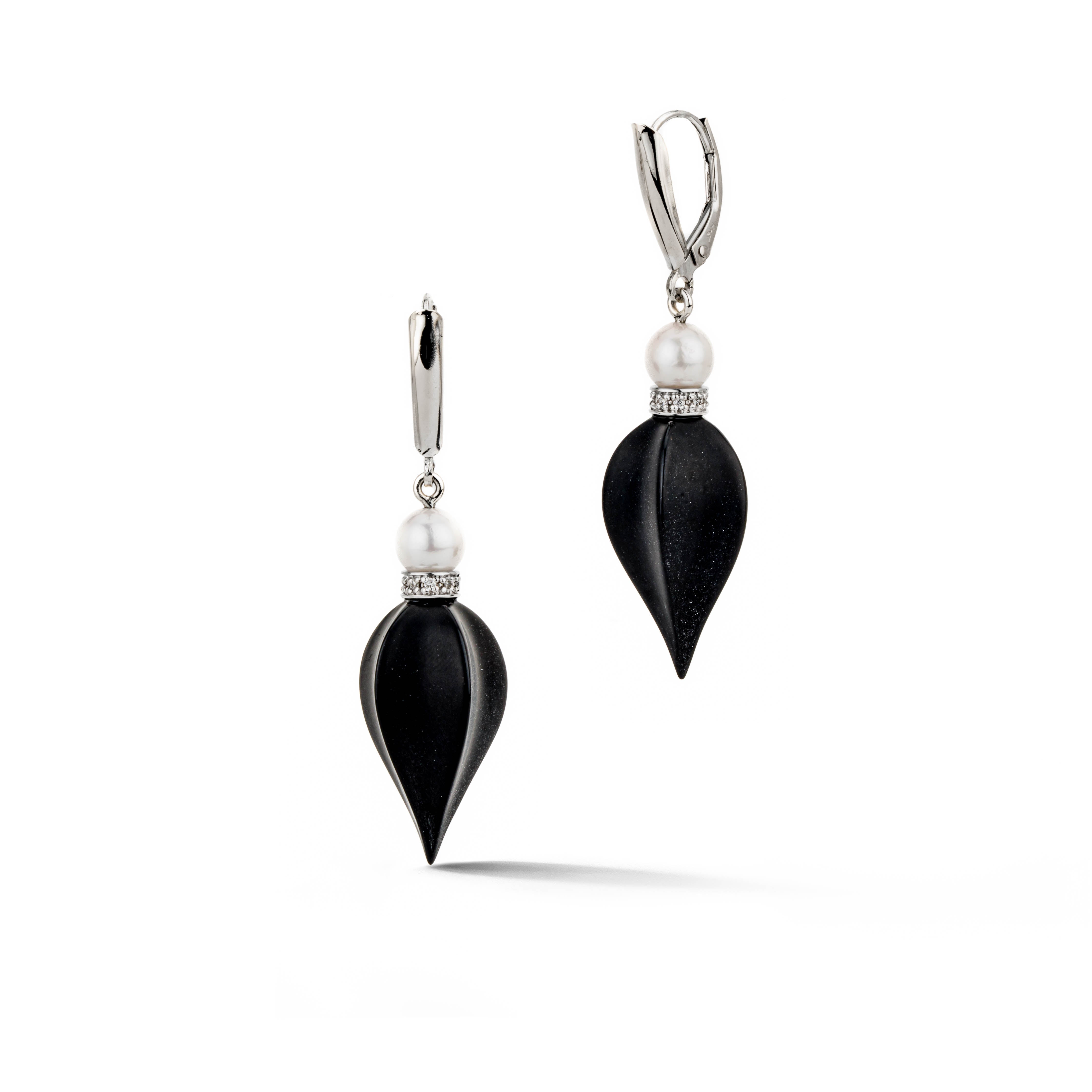 One of a kind 14k white gold drop earrings featuring hand-carved black onyx, Akoya pearls, and diamond rondels on lever backs