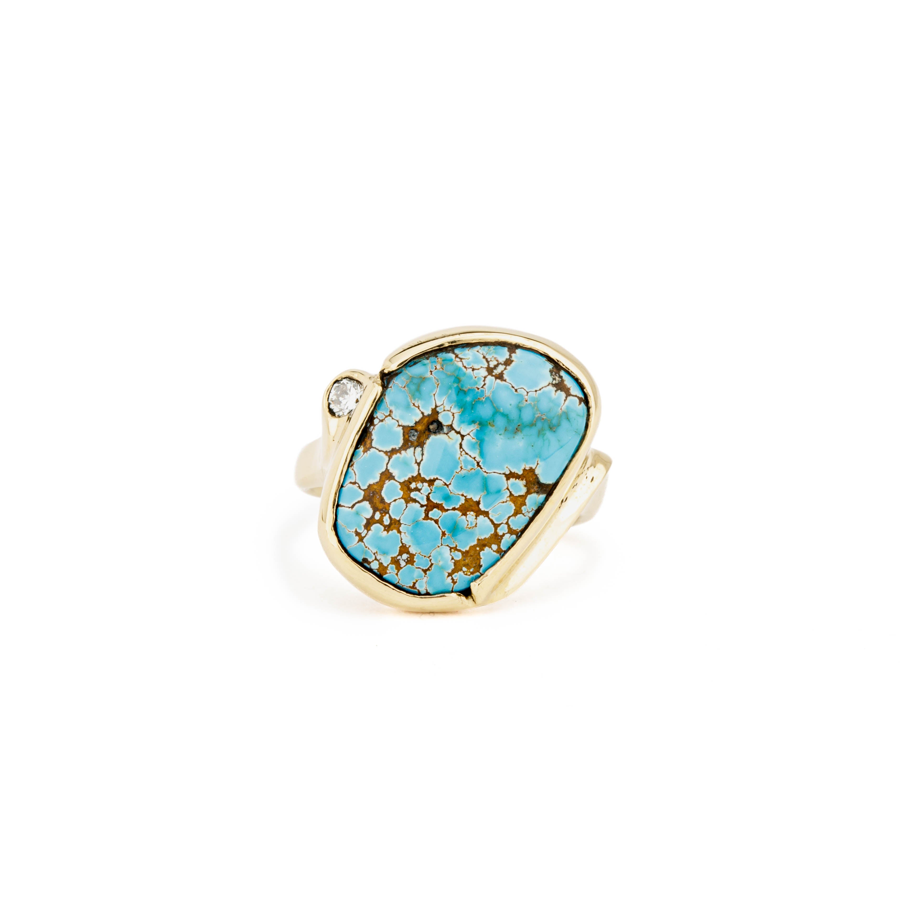 14k yellow gold ring with 7.2ct natural Lone Mountain turquoise in bezel setting and bezel-set round diamond accent, size 7