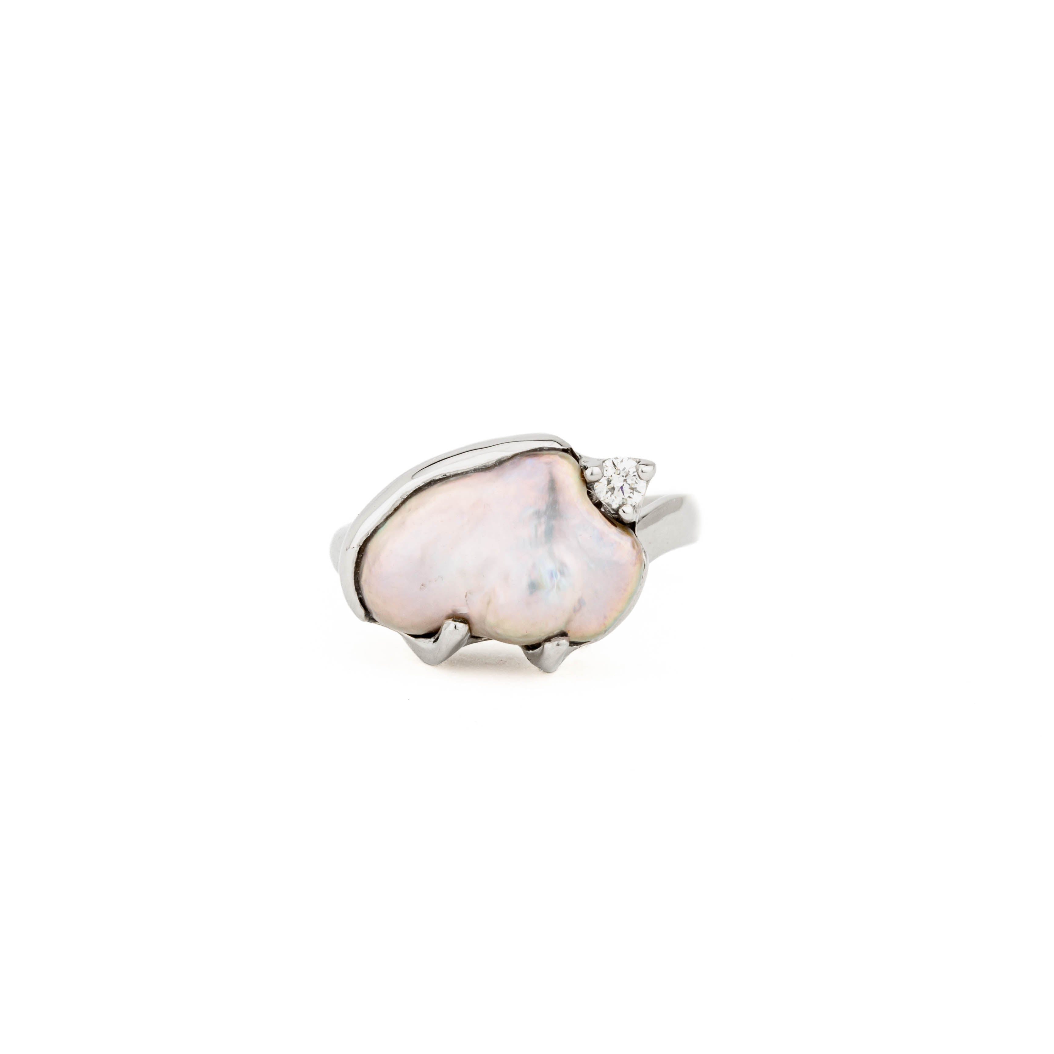 14k white gold ring with natural keshi freshwater pearl in freeform shape, accented by one round diamond, size 7.25