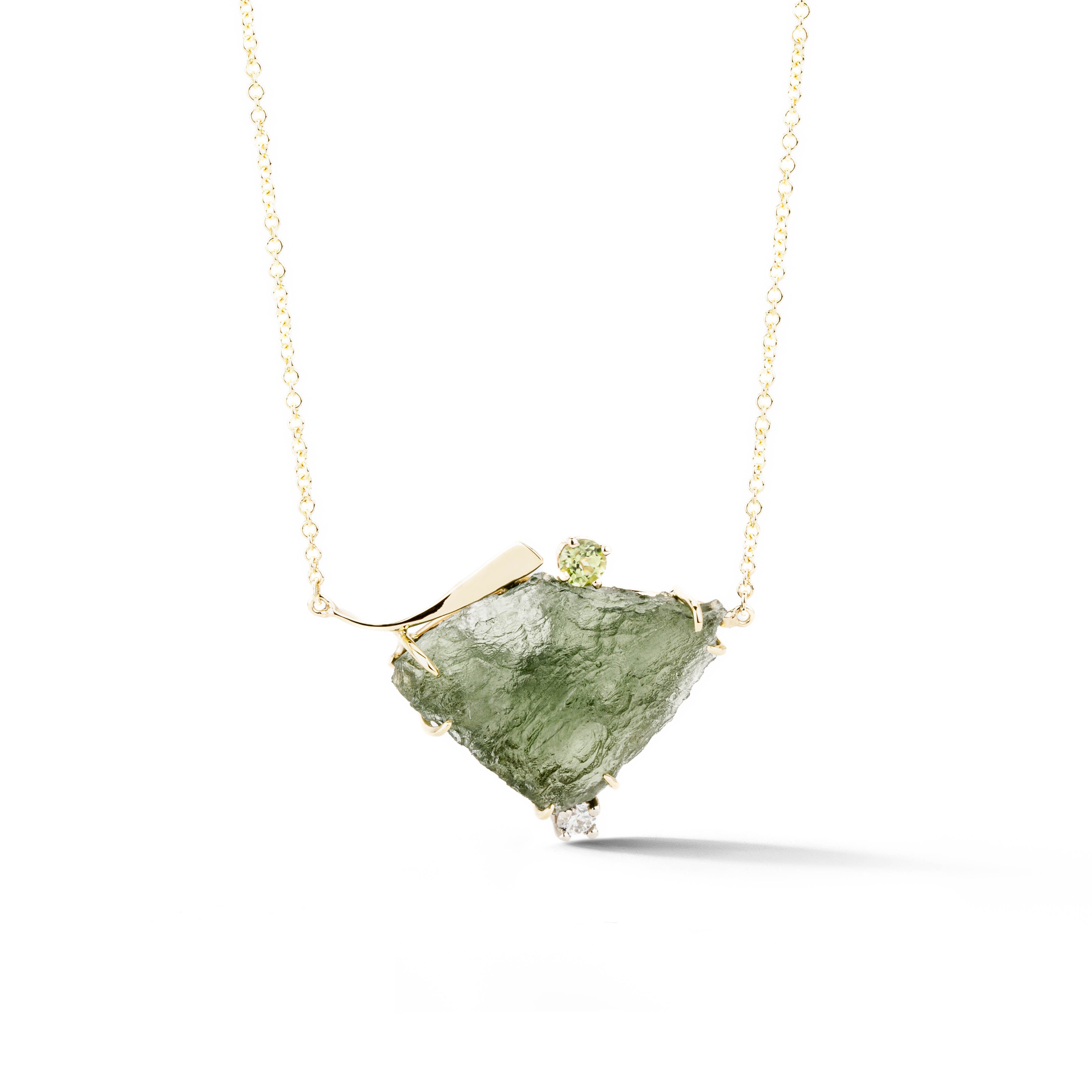 One-of-a-kind raw Moldavite necklace in 14k yellow gold with hand-forged prong setting, round peridot accent and diamond, on a cable chain