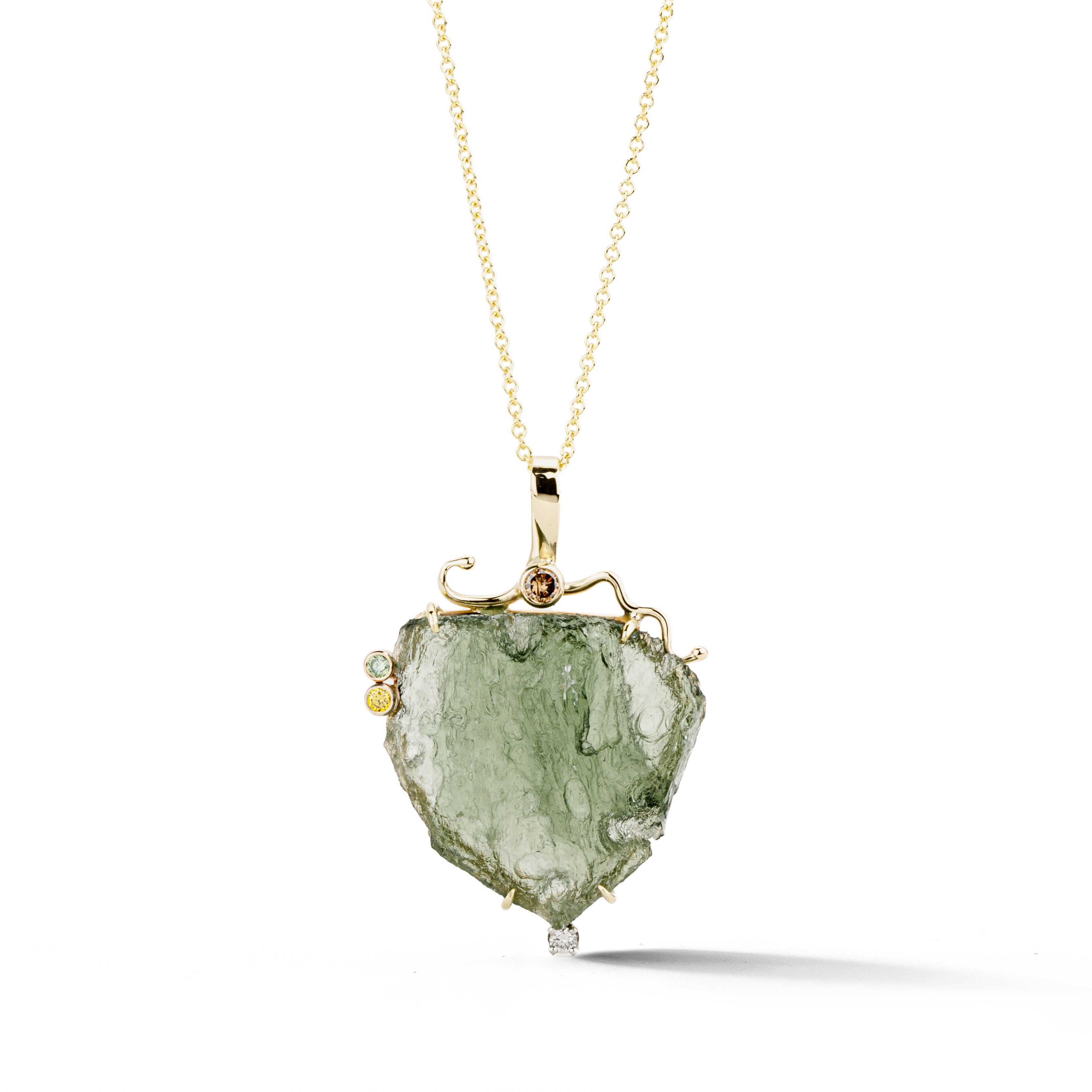 14k yellow gold pendant necklace with rough green Besednice moldavite stone, accented by champagne, golden yellow, and ice-green diamonds