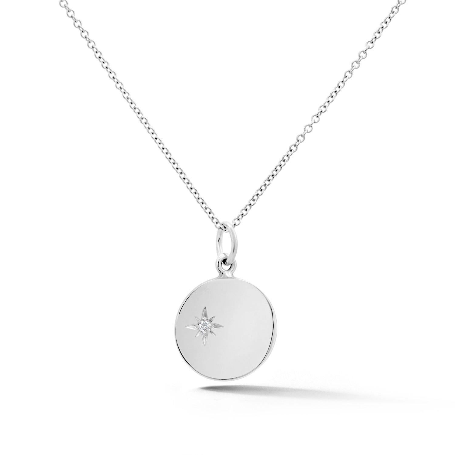 14k white gold round disc pendant with diamond starburst
