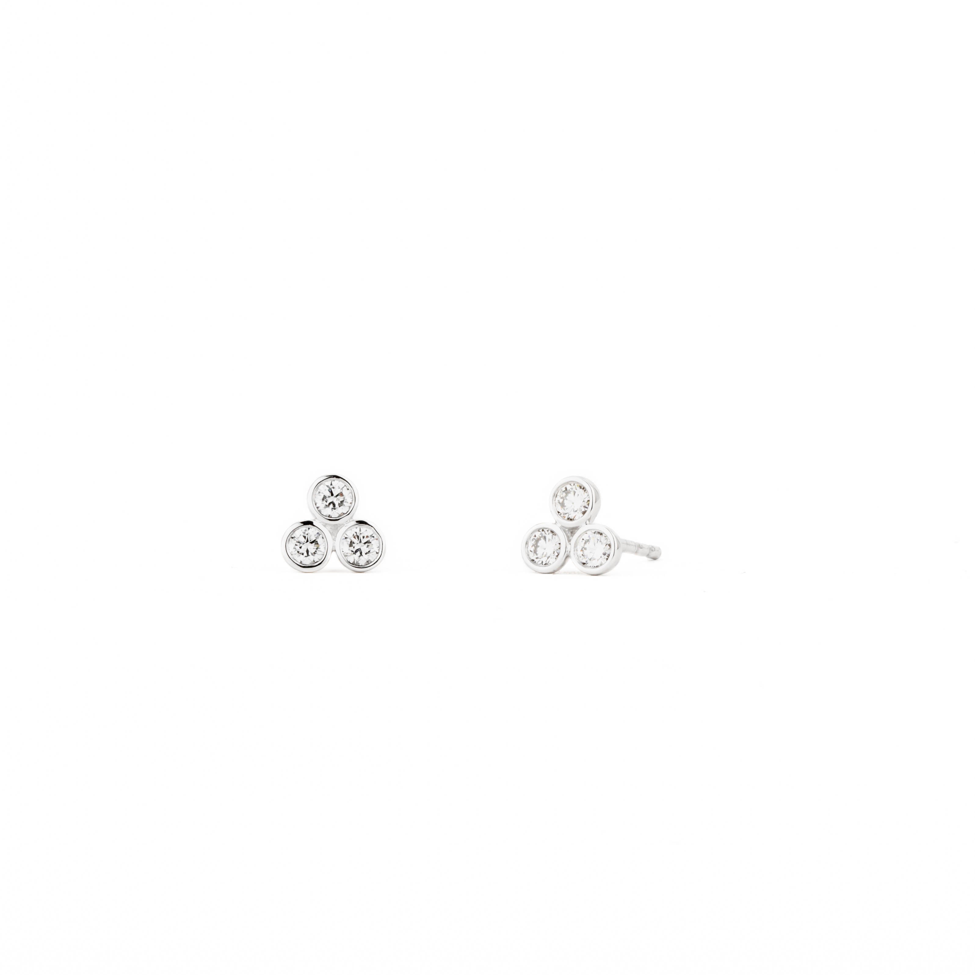 14k white gold three-diamond bezel-set cluster stud earrings with round natural diamonds totaling 0.31 carats