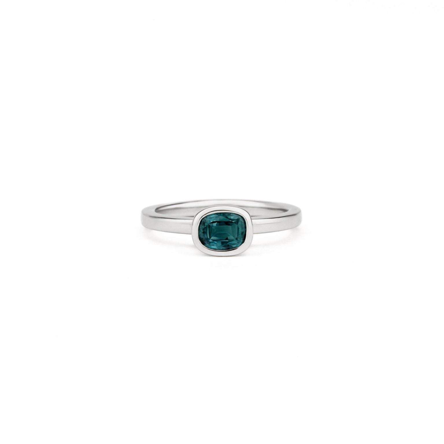 One of a kind alexandrite bezel ring in platinum with cushion cut stone