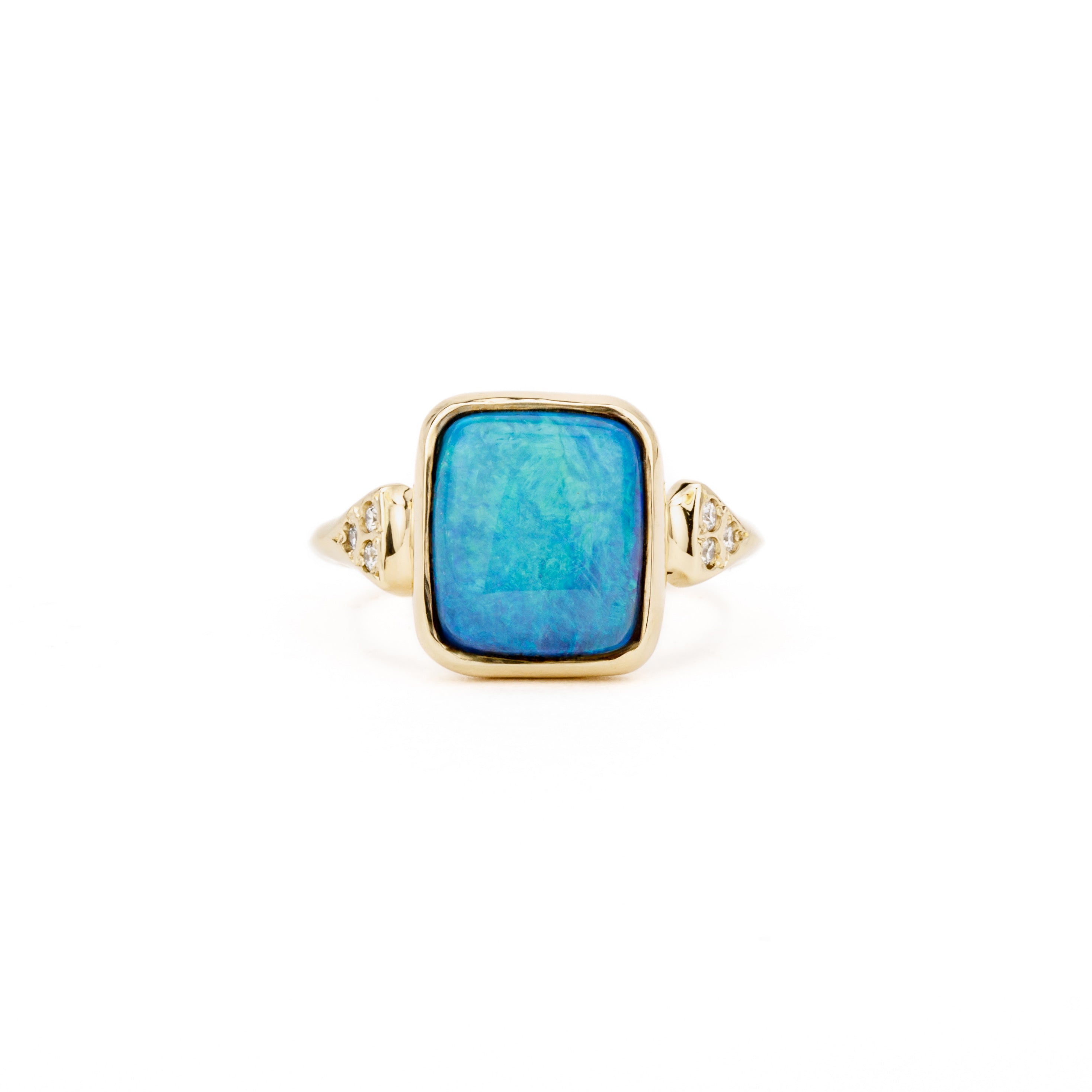 One-of-a-kind cushion opal ring in 14K yellow gold with diamond accents. Bezel-set design crafted in our Saratoga Springs studio since 1975.
