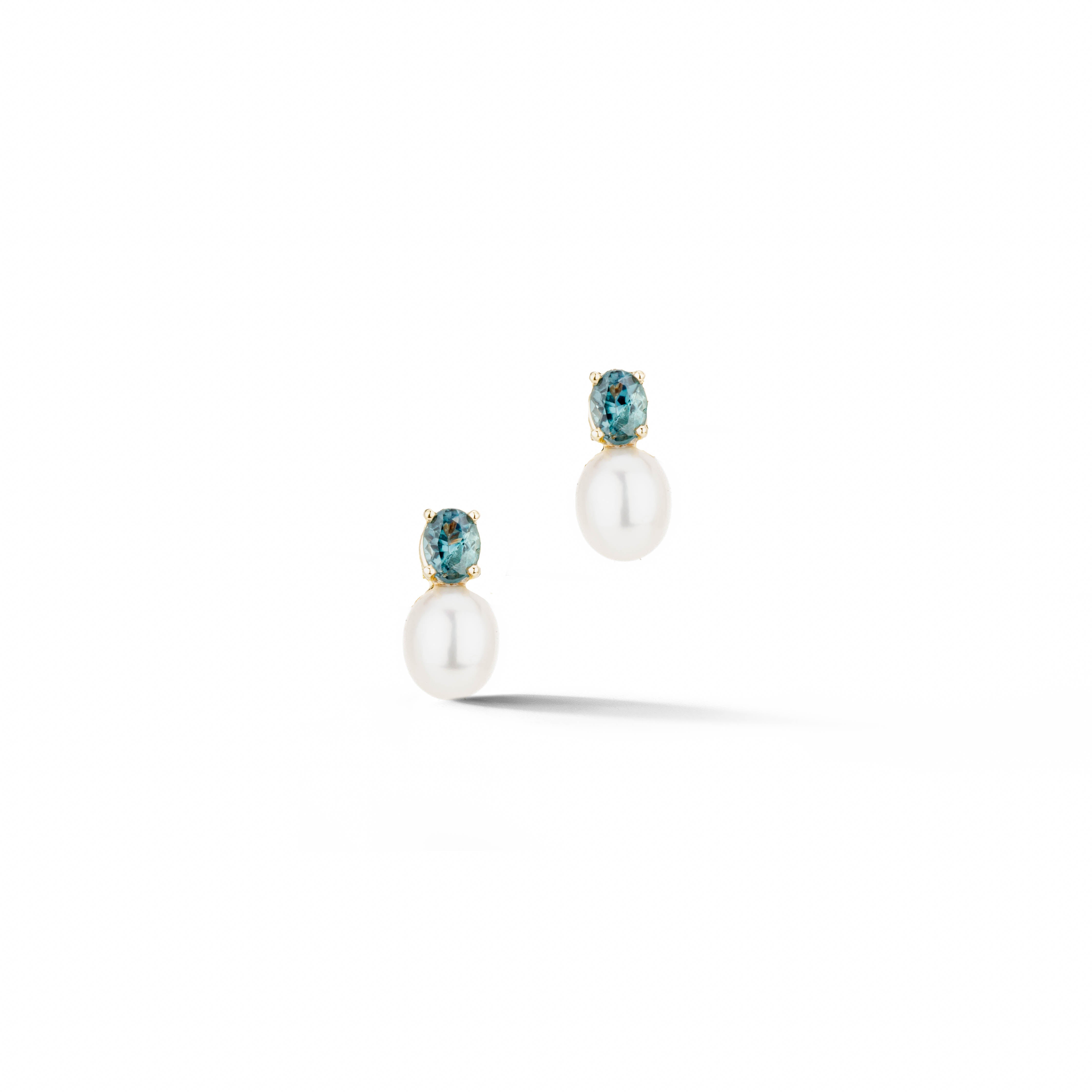 14k yellow gold stud earrings featuring prong set color-change alexandrites and oval freshwater pearls