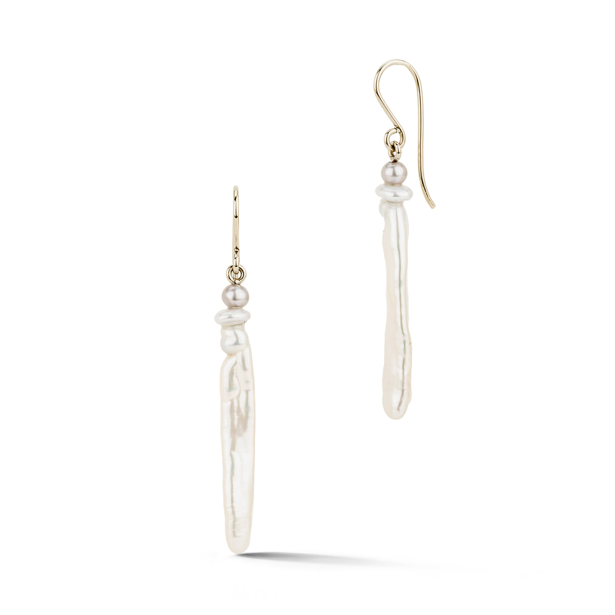 Pair of 14k white gold drop earrings with long white top-drilled stick pearls, small freshwater pearls, and French ear wires
