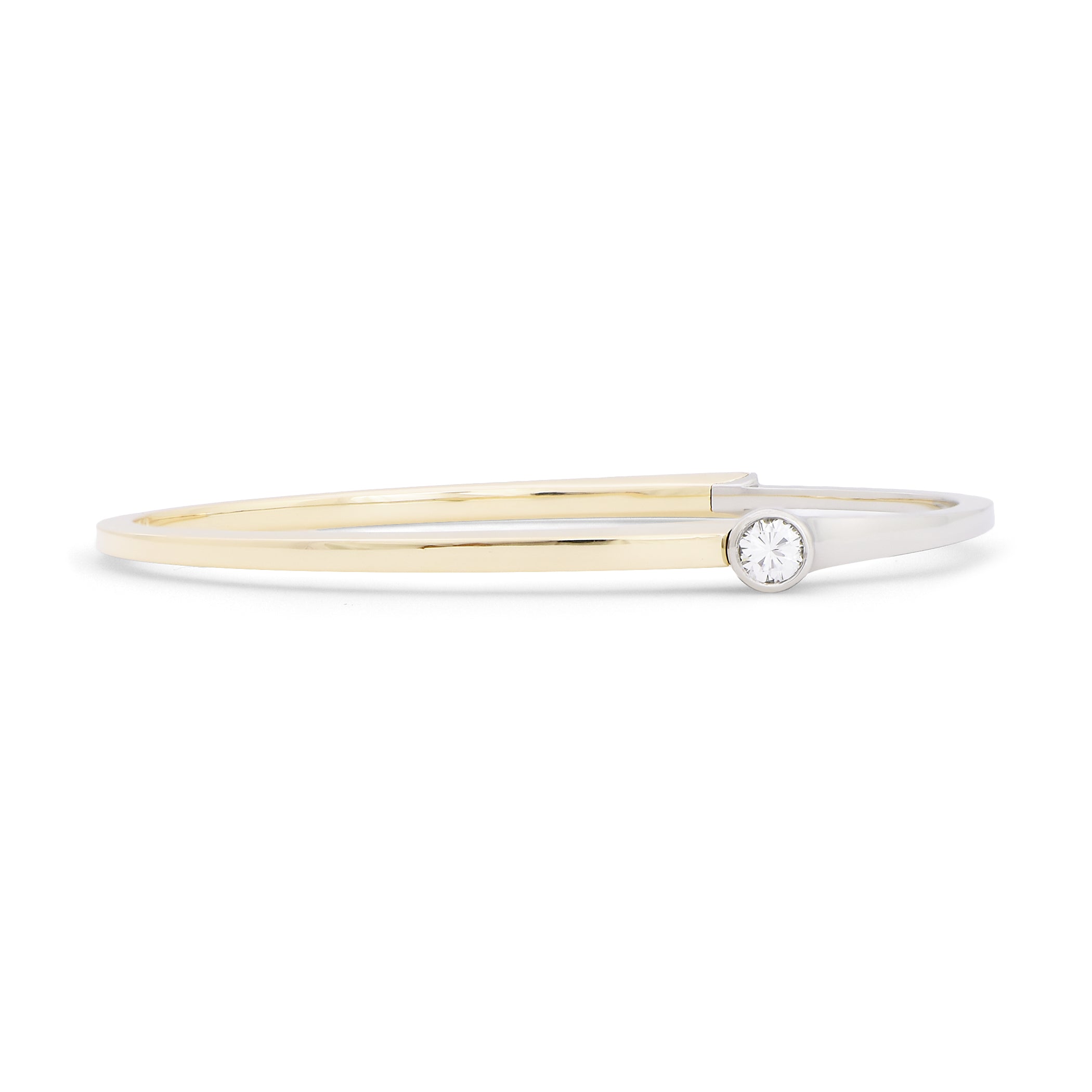  14k yellow and white gold hinged bangle bracelet with bezel-set 0.60ct round diamond, two-tone