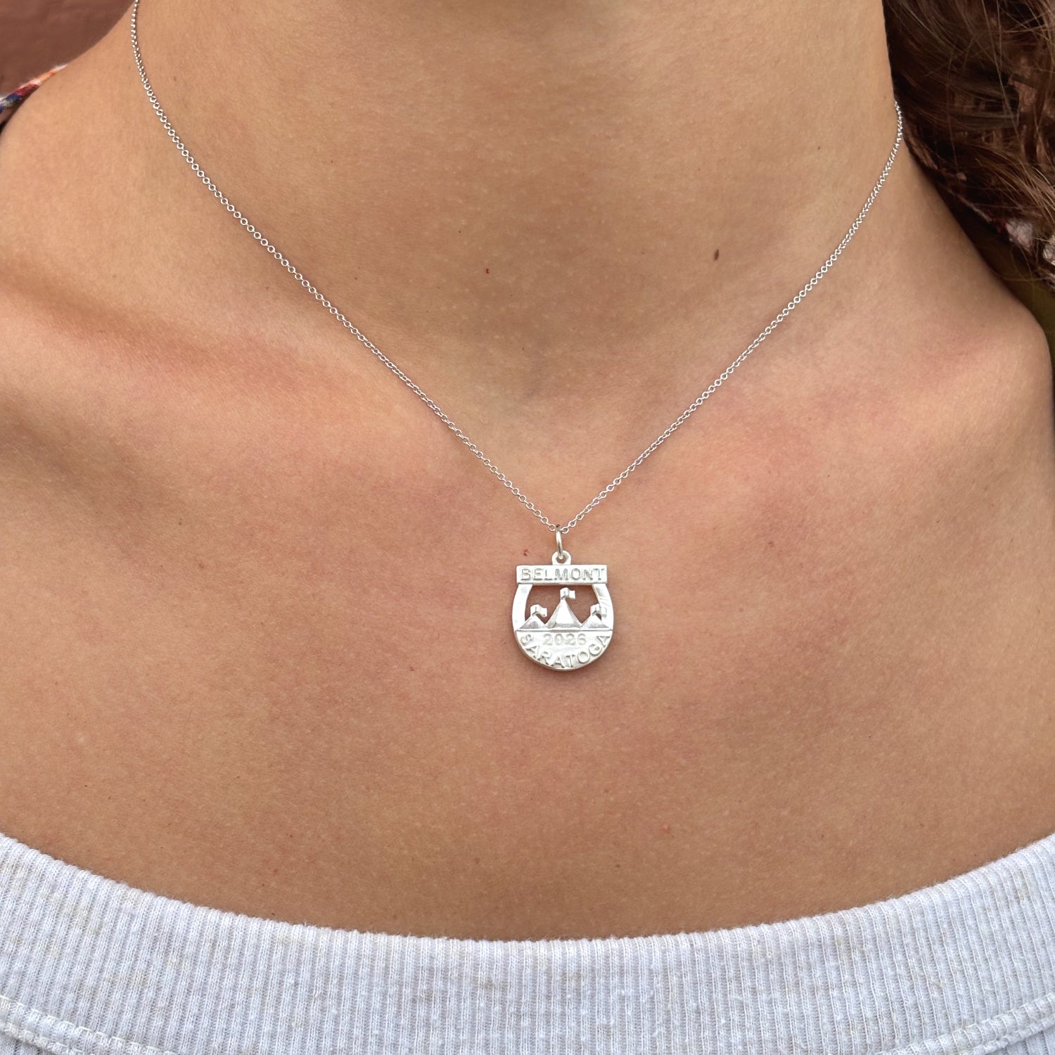 14k yellow gold limited edition 2026 Belmont at Saratoga horse racing charm featuring the Saratoga Race Course entrance steeples, by deJonghe Jewelry