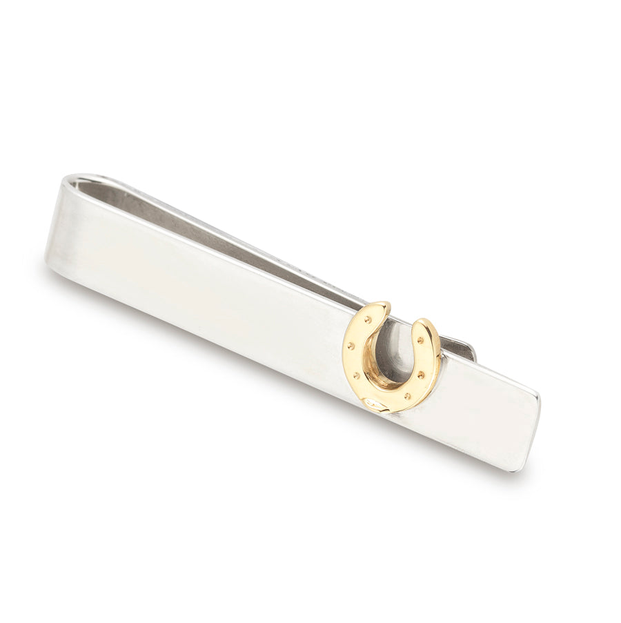 Polished sterling silver tie bar with 14k yellow gold horseshoe accent