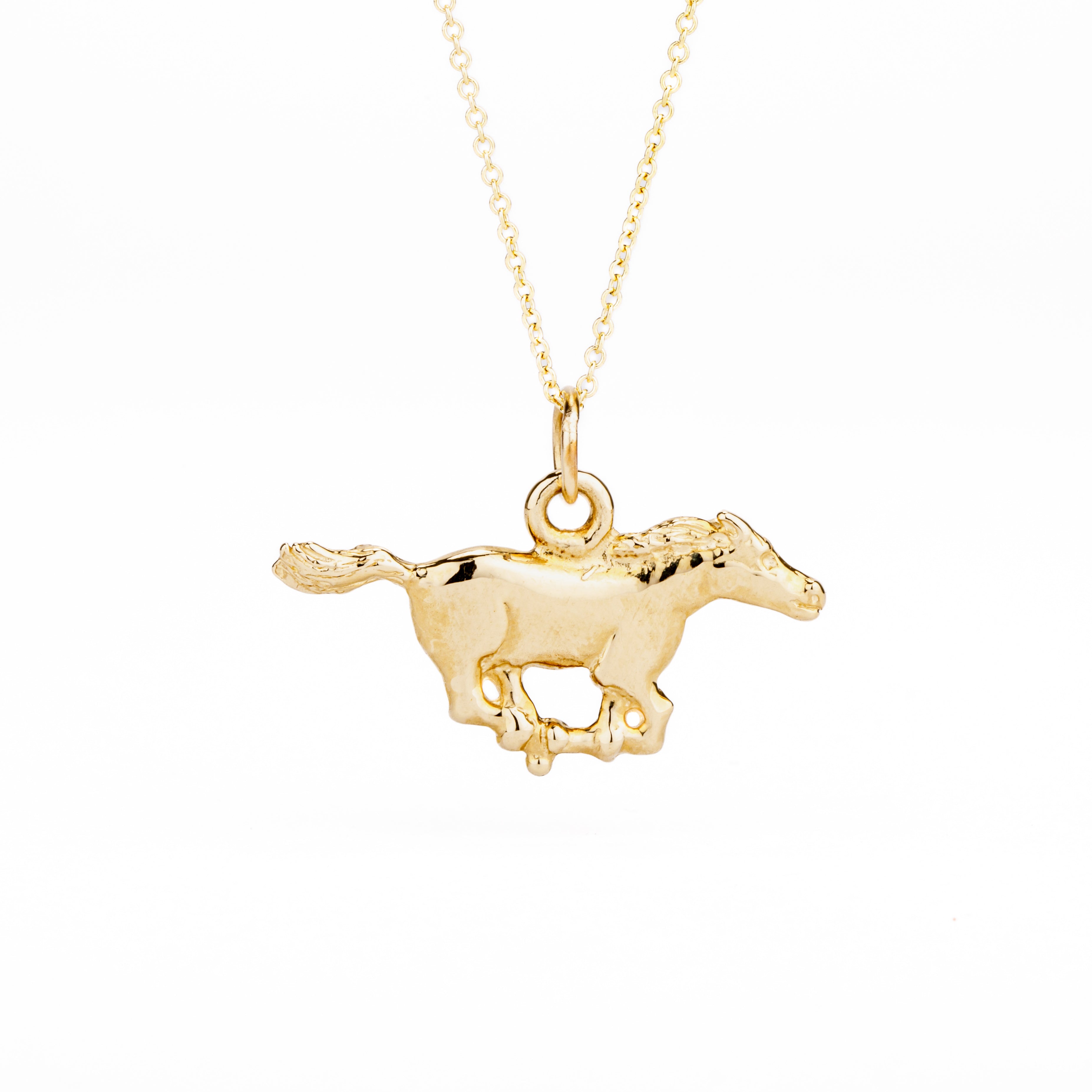 Large running horse in 14k yellow gold from our exclusive equestrian collection