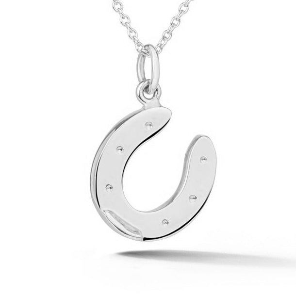Sterling silver horseshoe pendant with nail hole details from deJonghe Jewelry exclusive Equestrian Collection