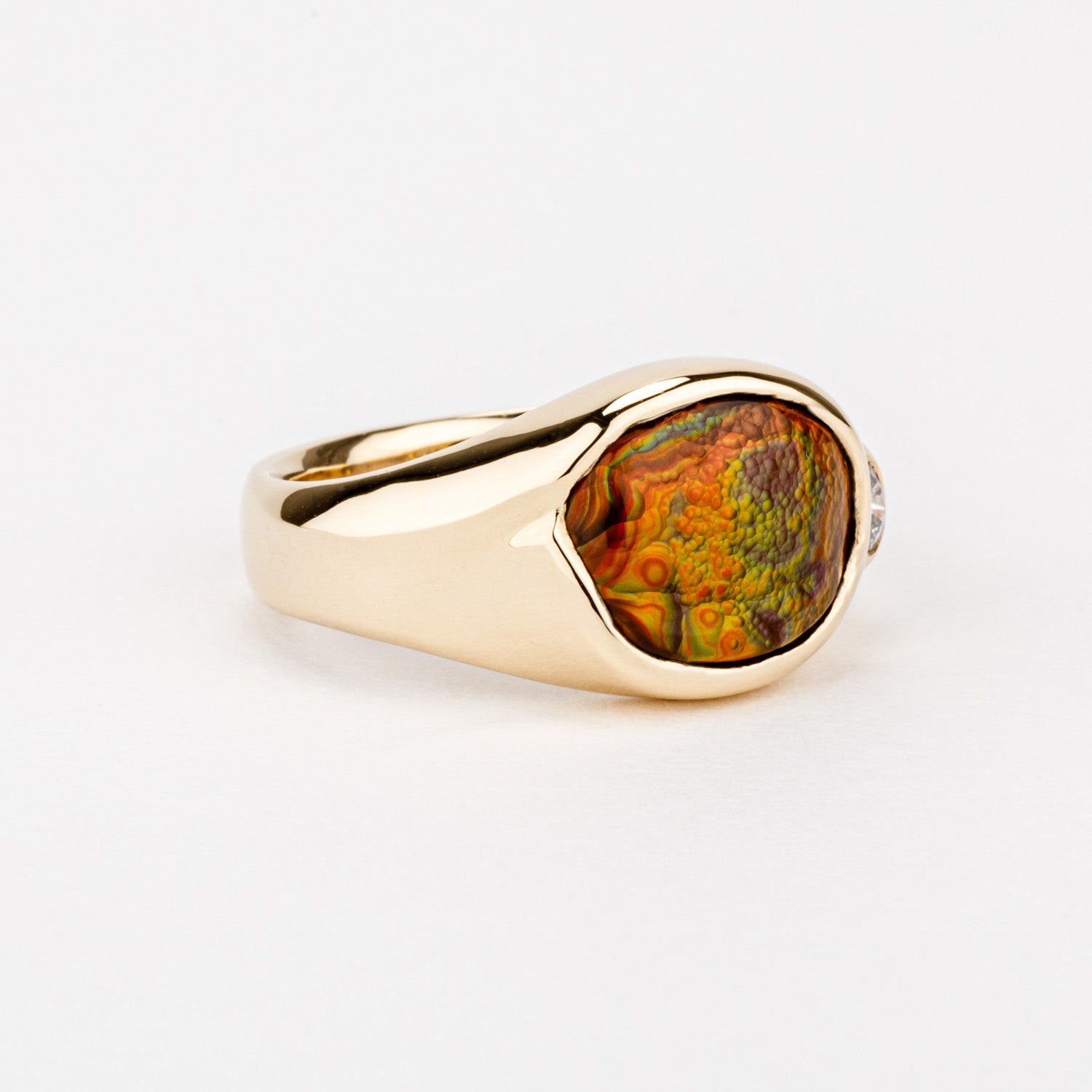Fire agate signet ring in 14k yellow gold with diamond accent 