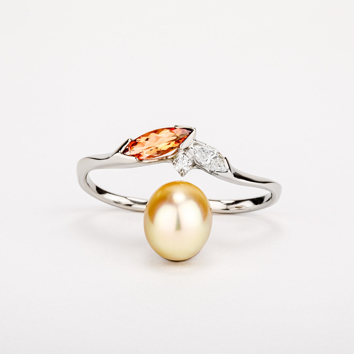 One of a kind golden Tahitian pearl double finger ring with imperial topaz and diamond in 14k white gold