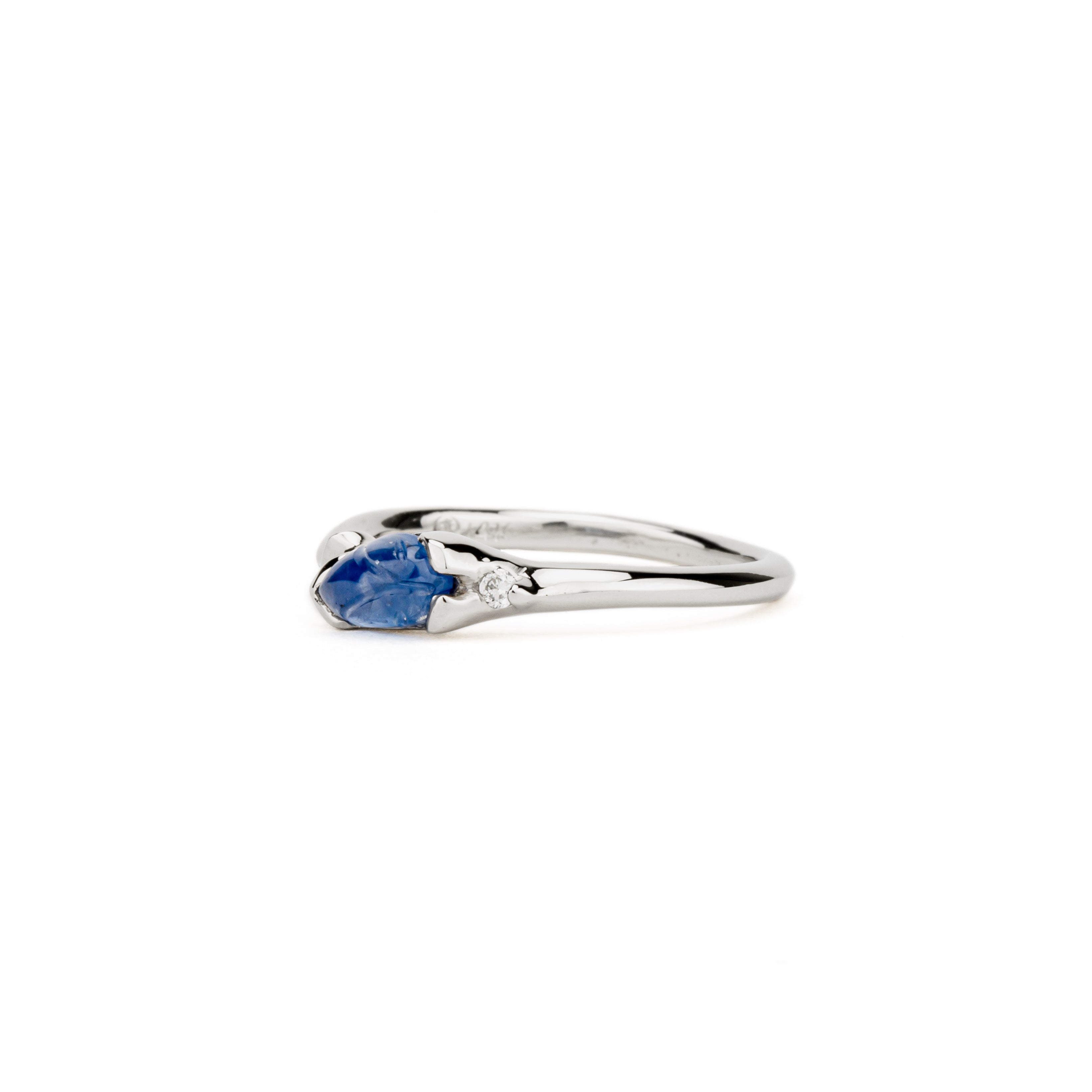 One of a kind carved blue sapphire leaf ring with diamond accent in white gold by deJonghe Jewelry