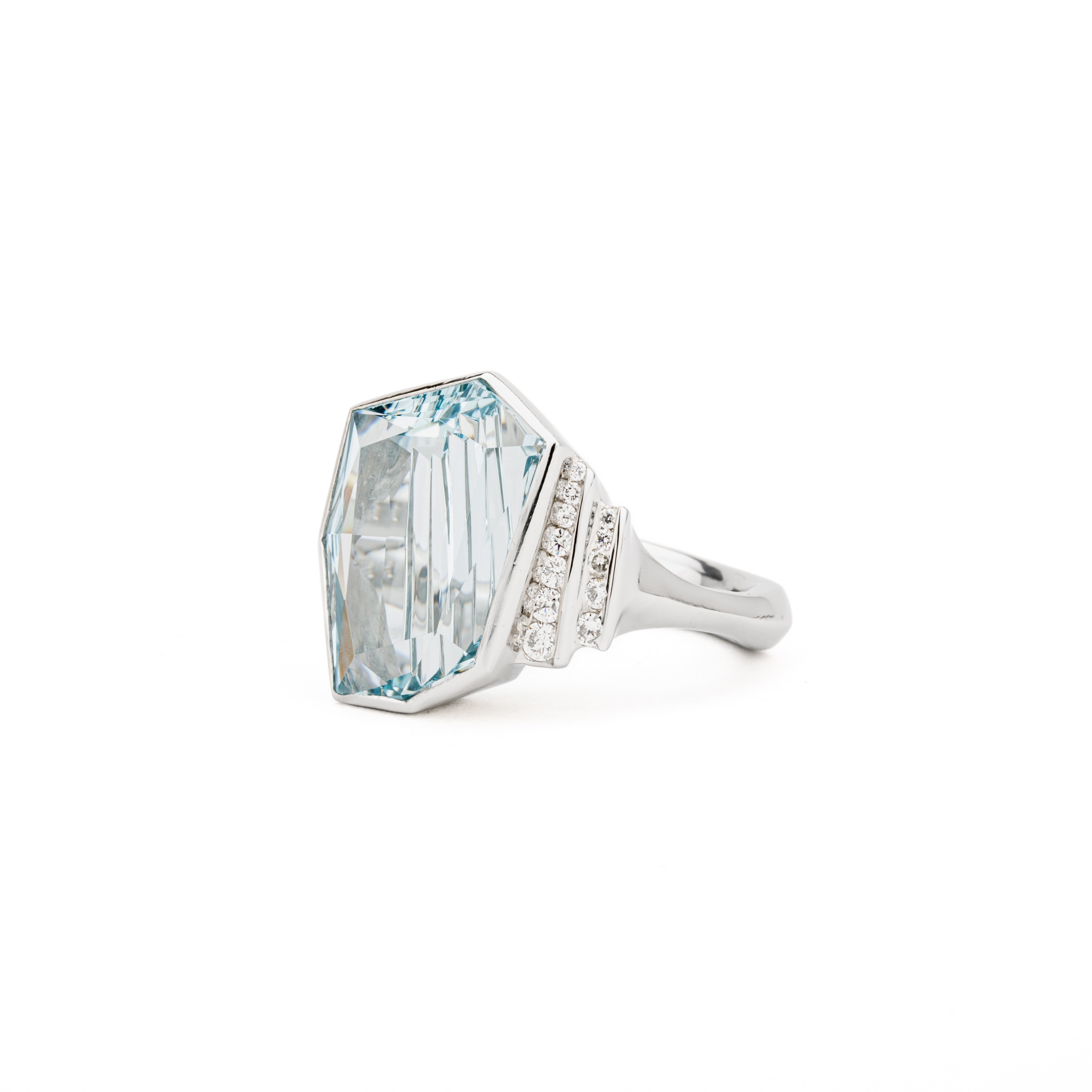 Platinum aquamarine ring with Kreis cut aquamarine gemstone and diamond accent