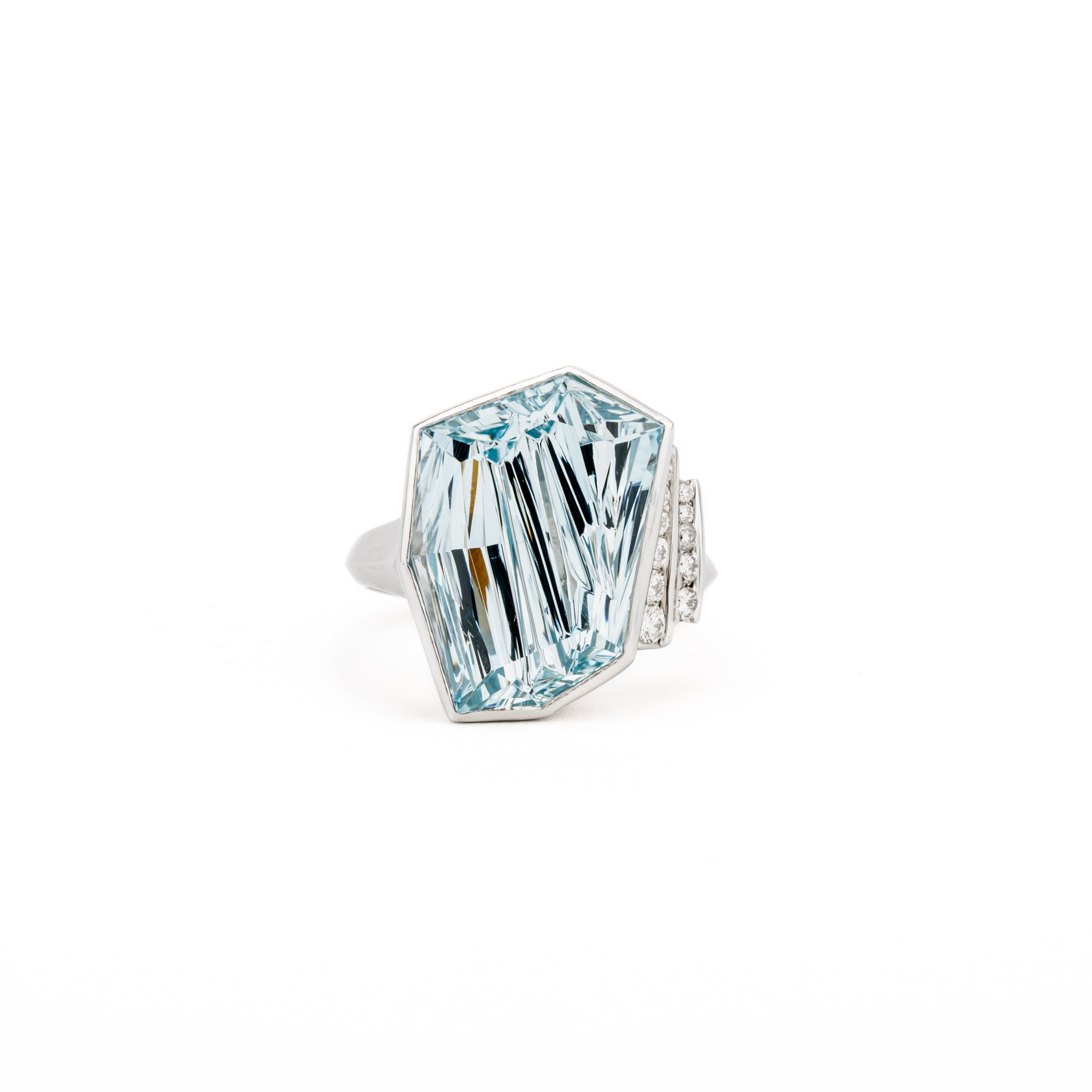 Platinum aquamarine ring with Kreis cut aquamarine gemstone and diamond accent