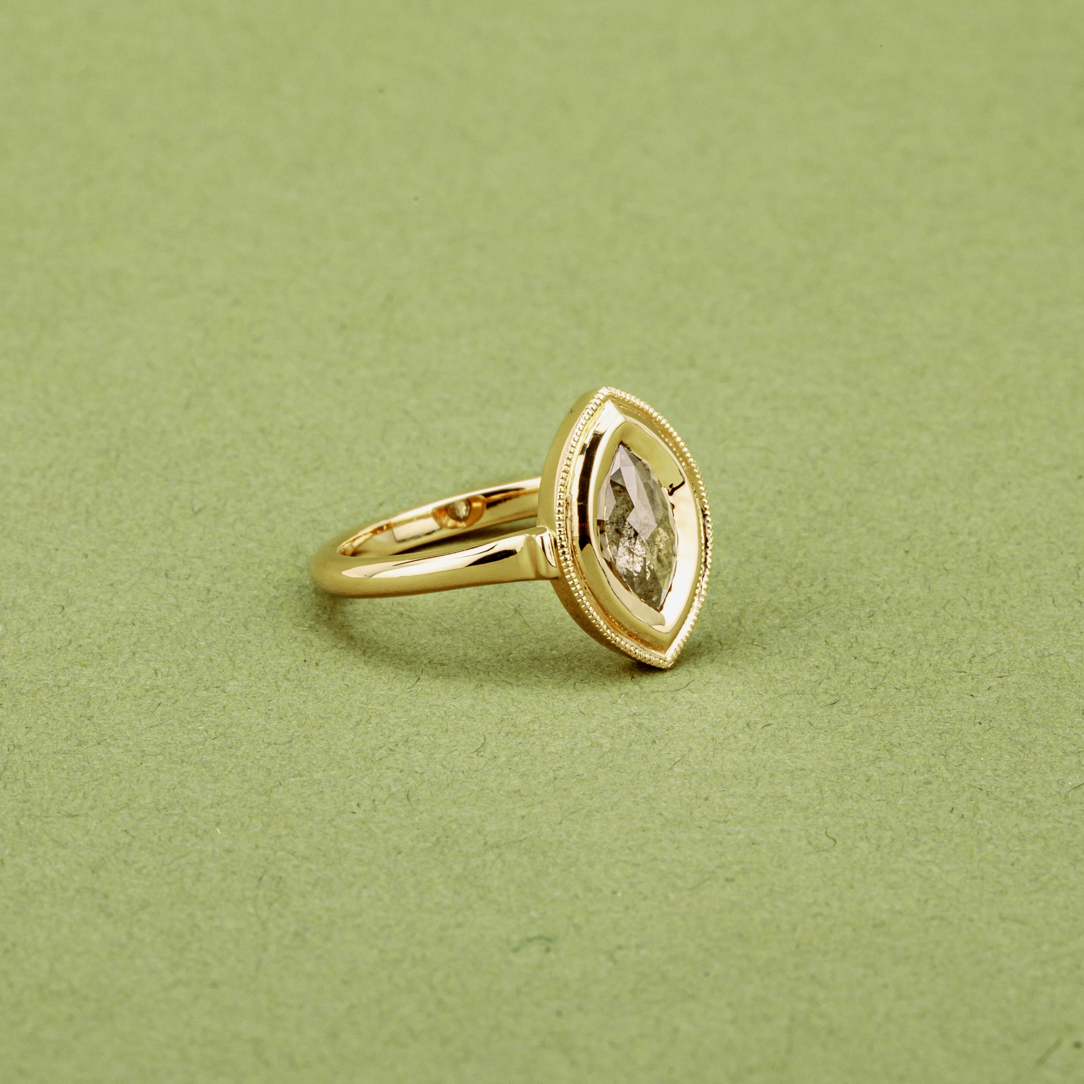 Marquise champagne diamond ring in 14k yellow gold with milgrain detail and rosecut center stone