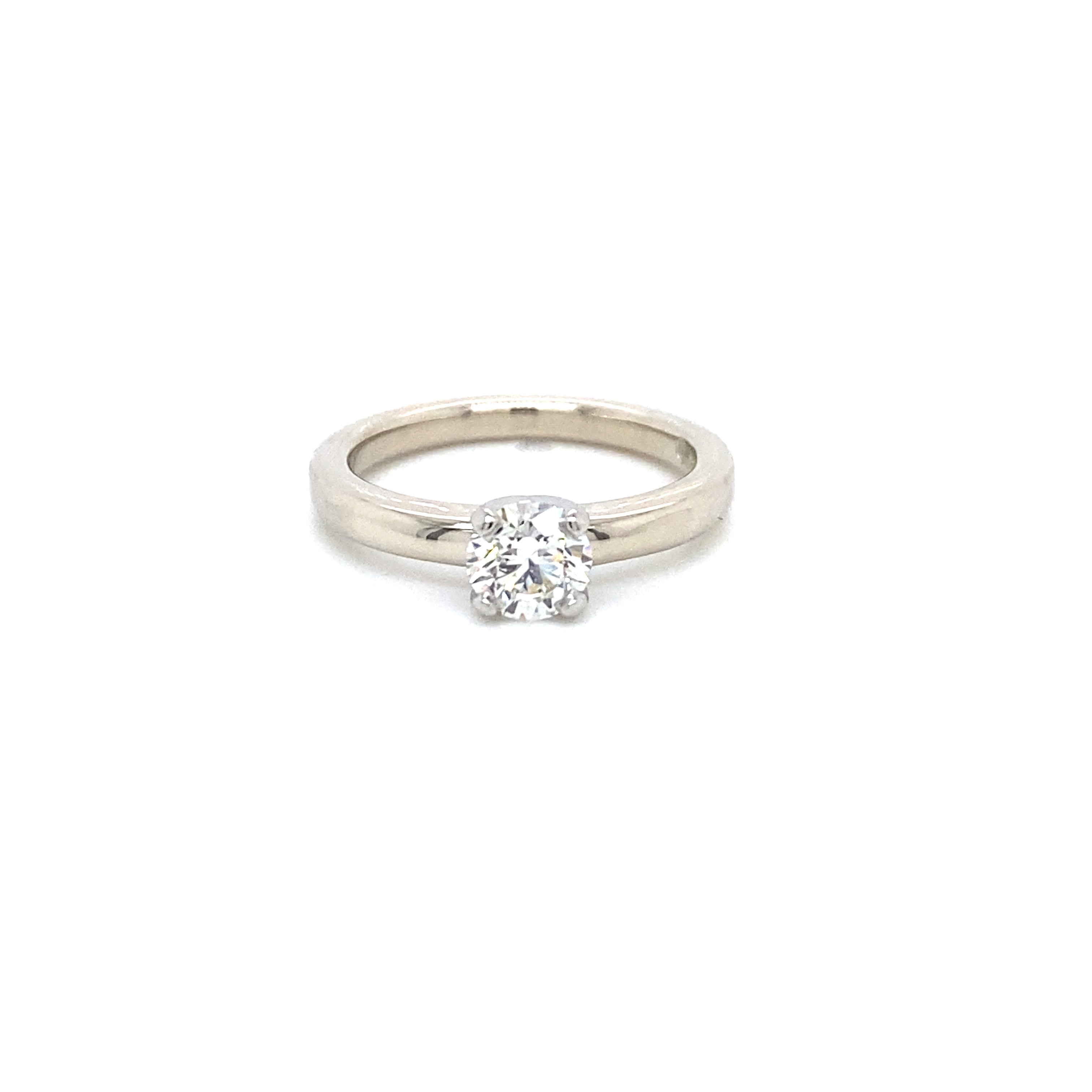 Round brilliant diamond solitaire engagement ring with 0.72ct H/SI1 diamond in 14k white gold four-prong setting