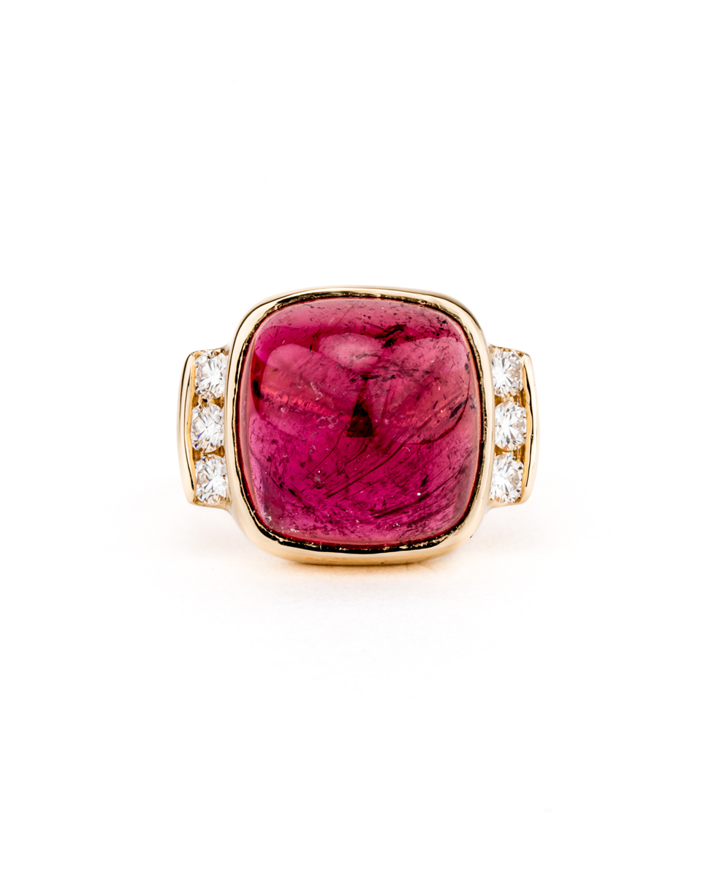 14k yellow gold cocktail ring featuring a 15.90ct sugarloaf cabochon pink tourmaline with channel-set diamond shoulders