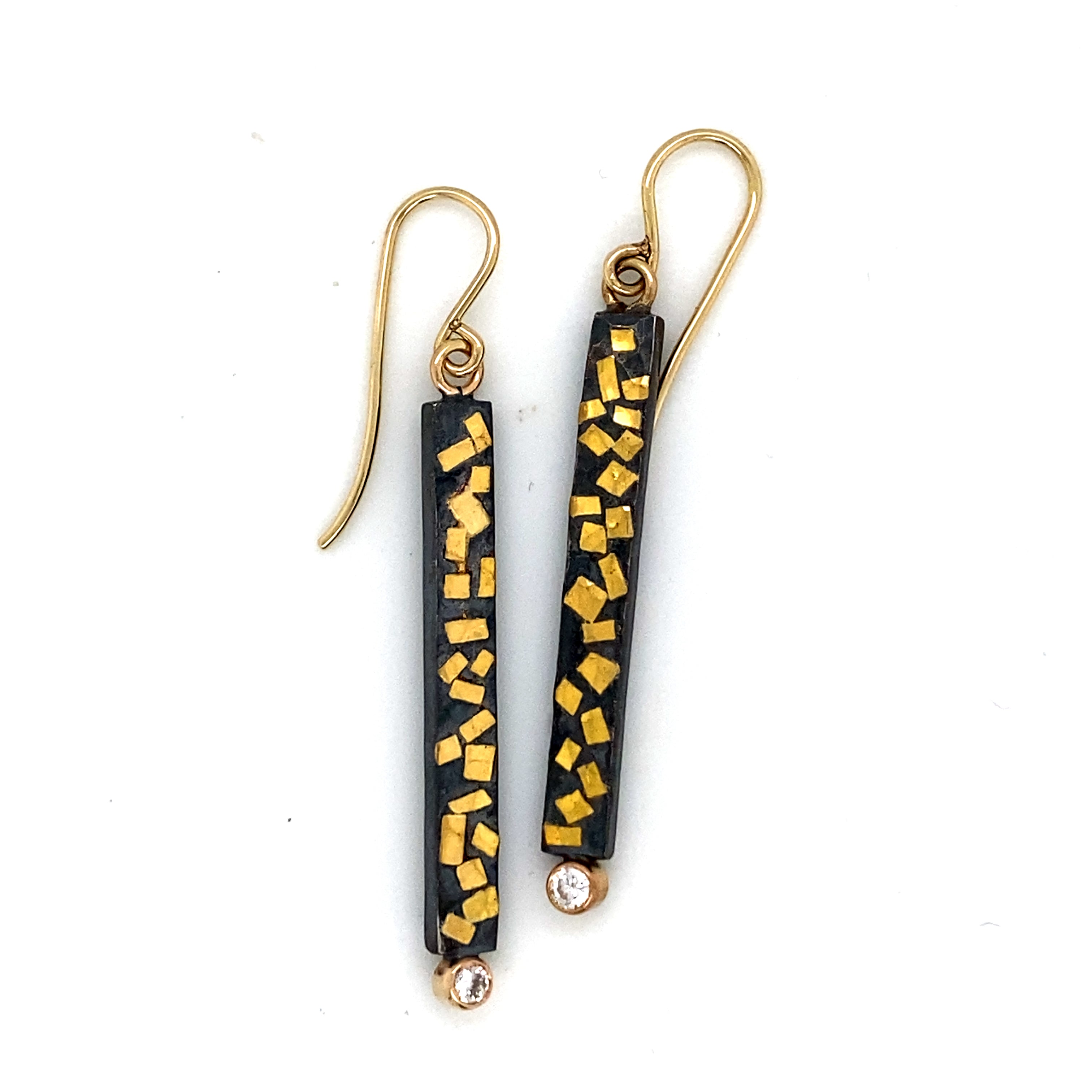 Oxidized sterling silver bar drop earrings with scattered 22k yellow gold accents and bezel-set diamond tips in 14k gold