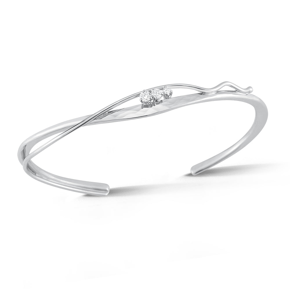 14k white gold hand-forged cuff bracelet with hammered texture, curved wire accent, and three bezel-set round diamonds, The Hathorn