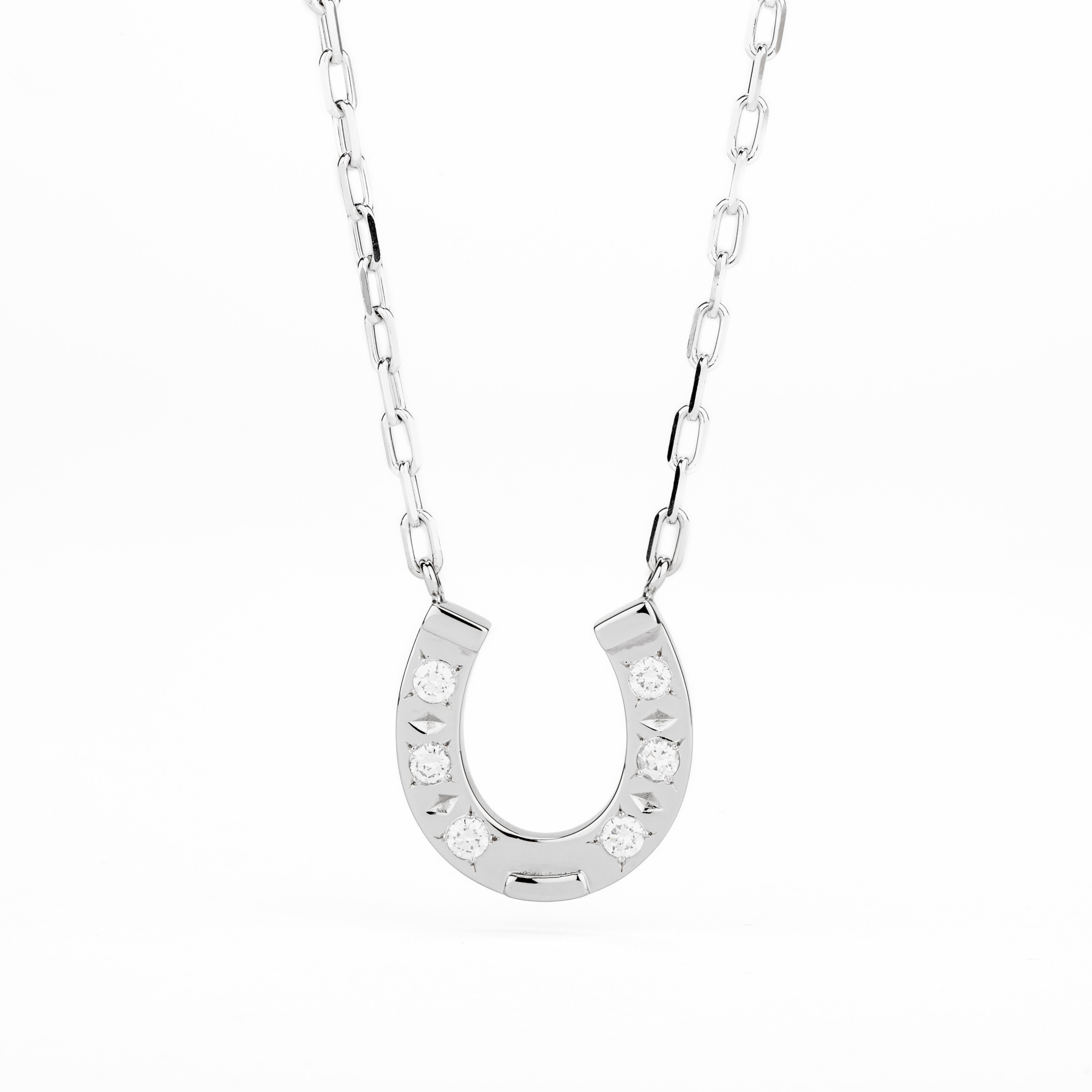 14k white gold horseshoe pendant necklace with six star-set round diamonds on a paperclip-link chain