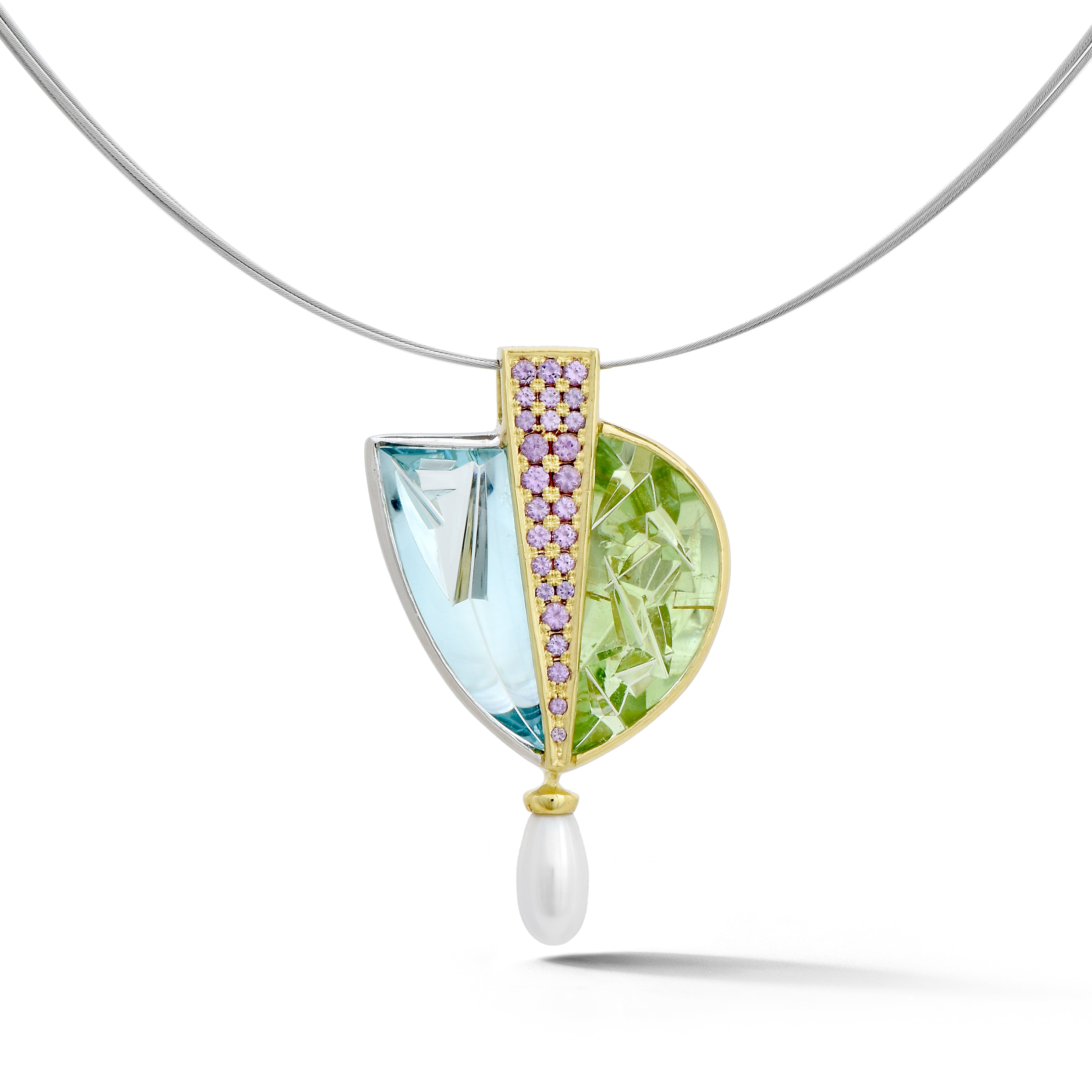 One-of-a-kind 18K green gold and platinum pendant featuring Munsteiner-cut aquamarine and green tourmaline with pavé purple sapphires and a freshwater pearl drop