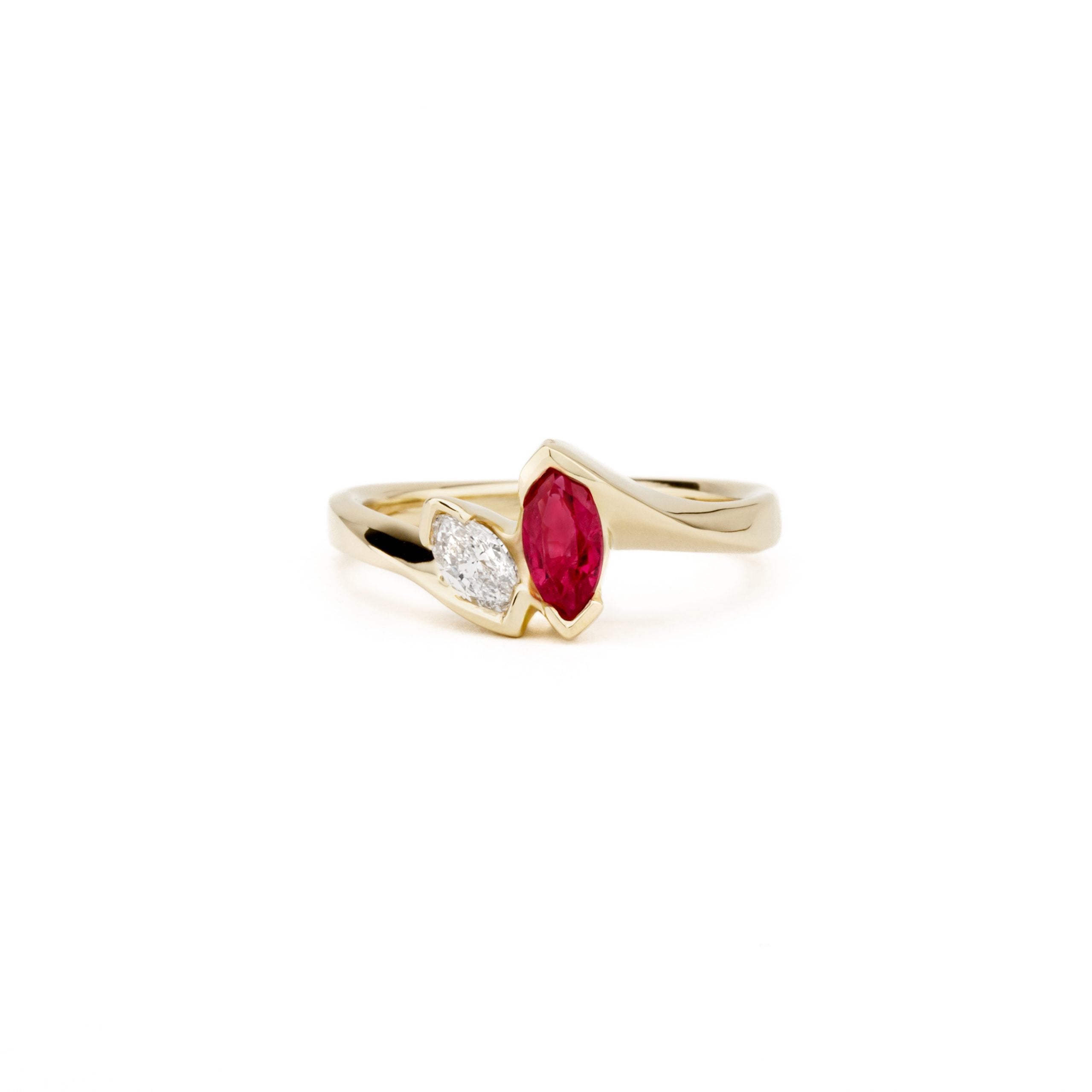 14k yellow gold bypass ring with marquise ruby and diamond in V-prong settings