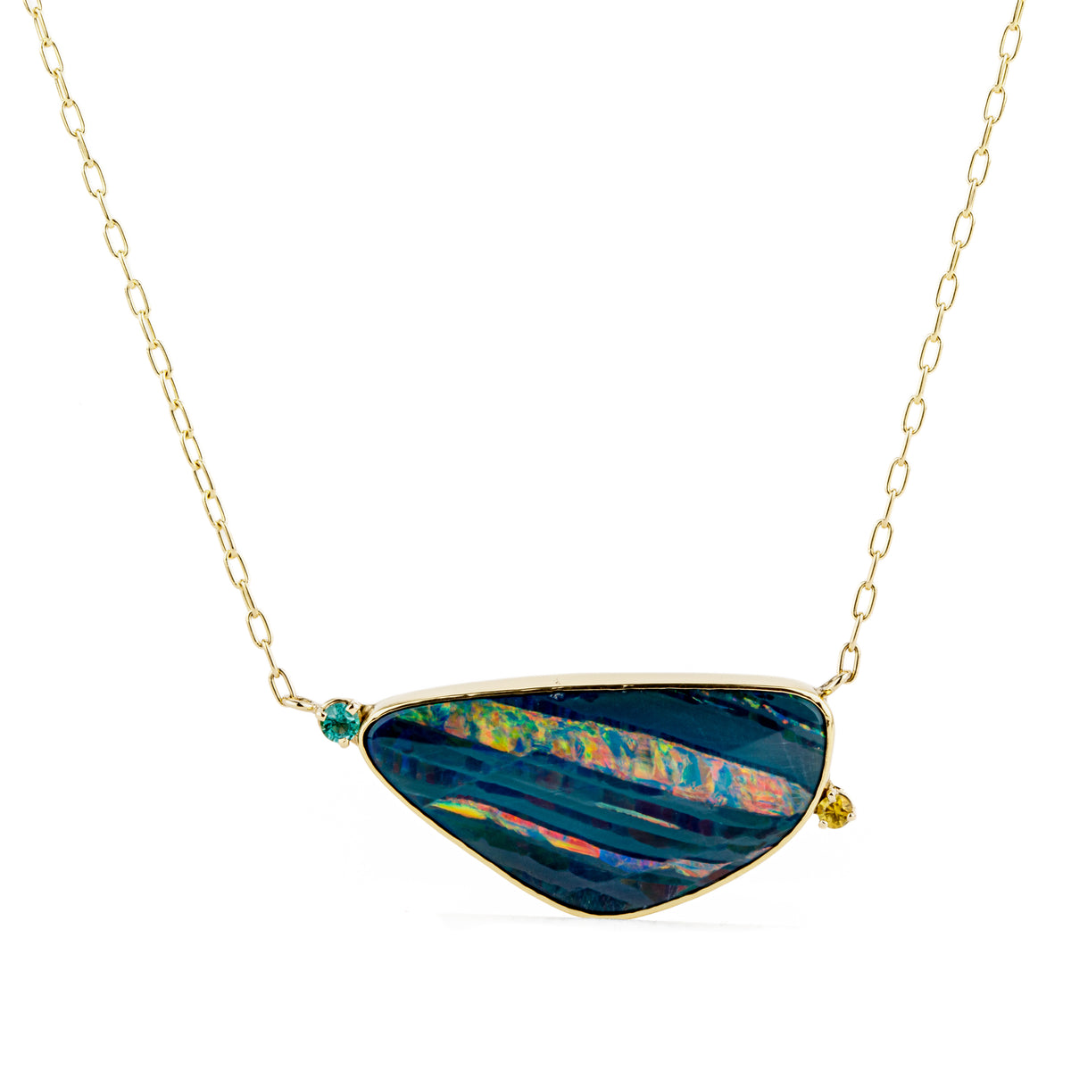 One of a kind yellow gold necklace with a large banded opal doublet, a small round emerald, and a yellow sapphire on an oval link chain